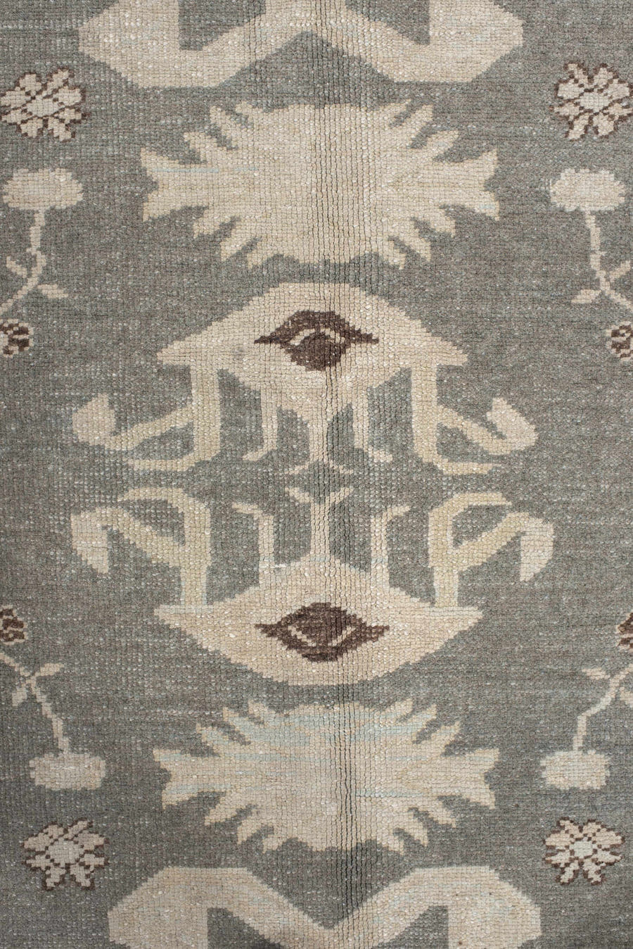 7' x 9' one-of-a-kind handmade vintage Anatolian rug. Color palette: charcoal, ivory, pale blue, taupe, brown, black, gray