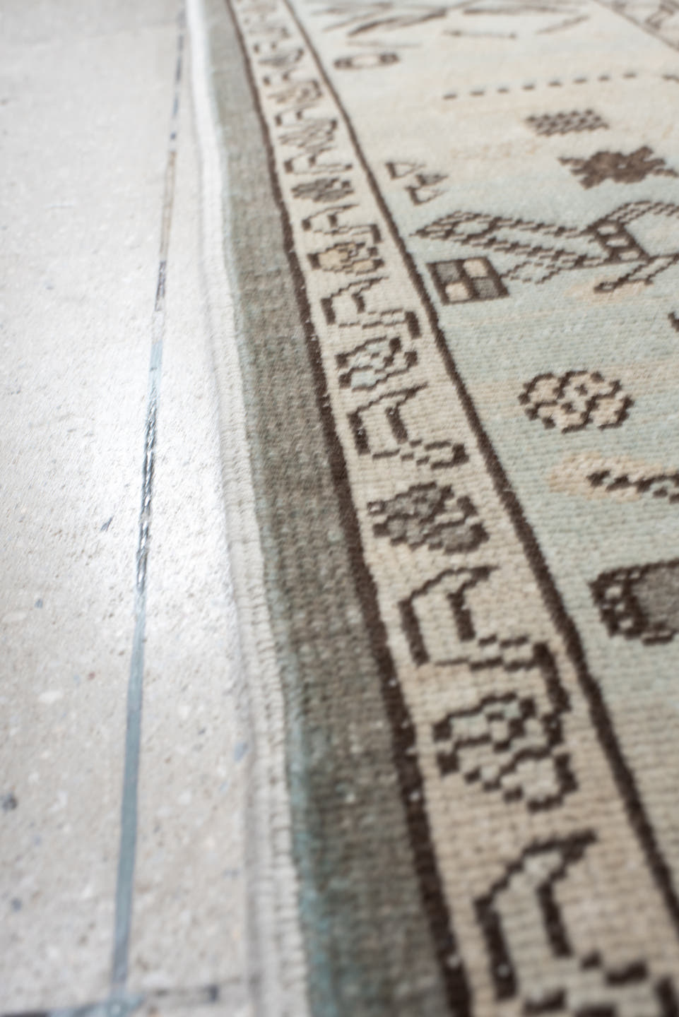 7' x 9' one-of-a-kind handmade vintage Anatolian rug. Color palette: charcoal, ivory, pale blue, taupe, brown, black, gray