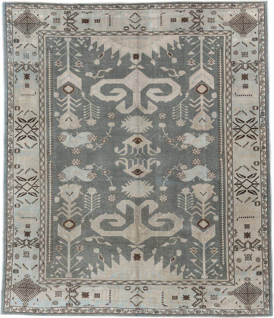 7' x 9' one-of-a-kind handmade vintage Anatolian rug. Color palette: ivory, slate, taupe, charcoal, brown, pale blue, gray