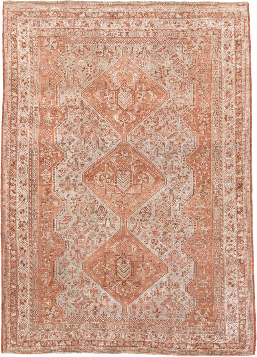 7' x 10' one-of-a-kind handmade antique Shiraz large size rug. Color palette: terra cotta, ivory, rose, rust, camel
