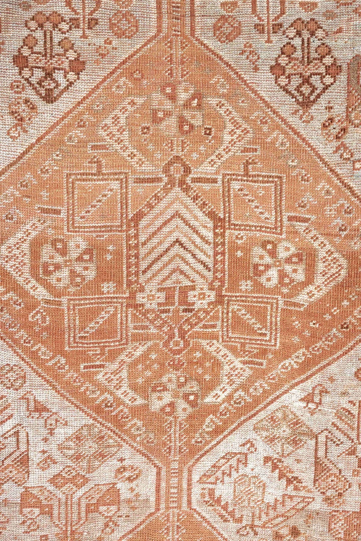 7' x 10' one-of-a-kind handmade antique Shiraz large size rug. Color palette: terra cotta, ivory, rose, rust, camel