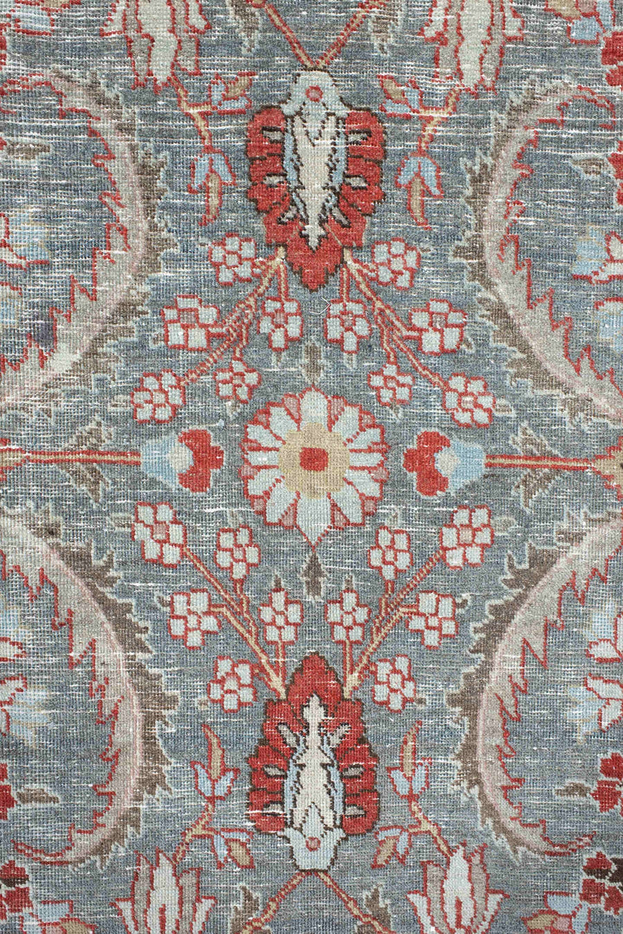 6' x 9' one-of-a-kind handmade antique Tabriz medium size rug. Color palette: light blue, camel, ivory, rust, brown, coral