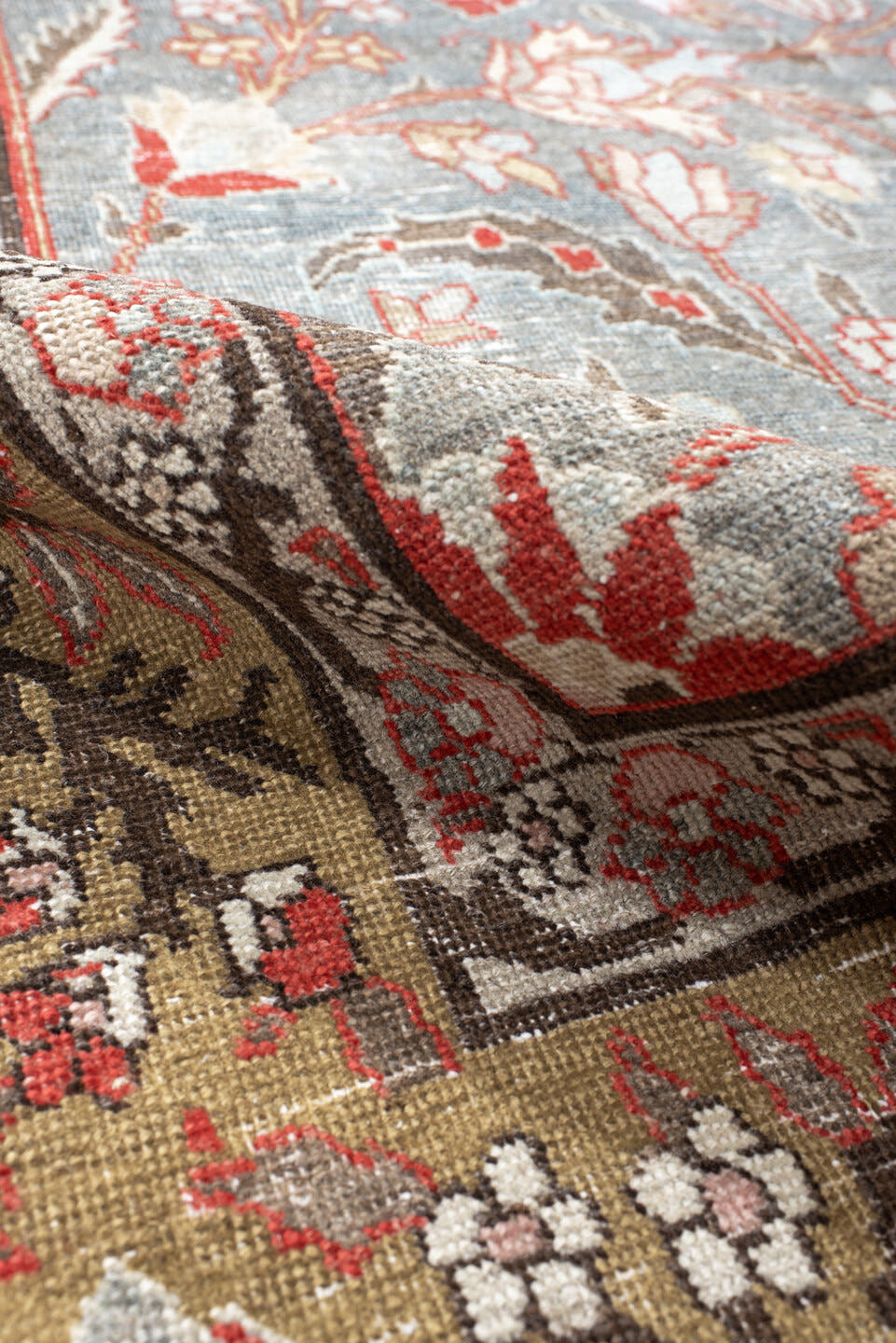 6' x 9' one-of-a-kind handmade antique Tabriz medium size rug. Color palette: light blue, camel, ivory, rust, brown, coral