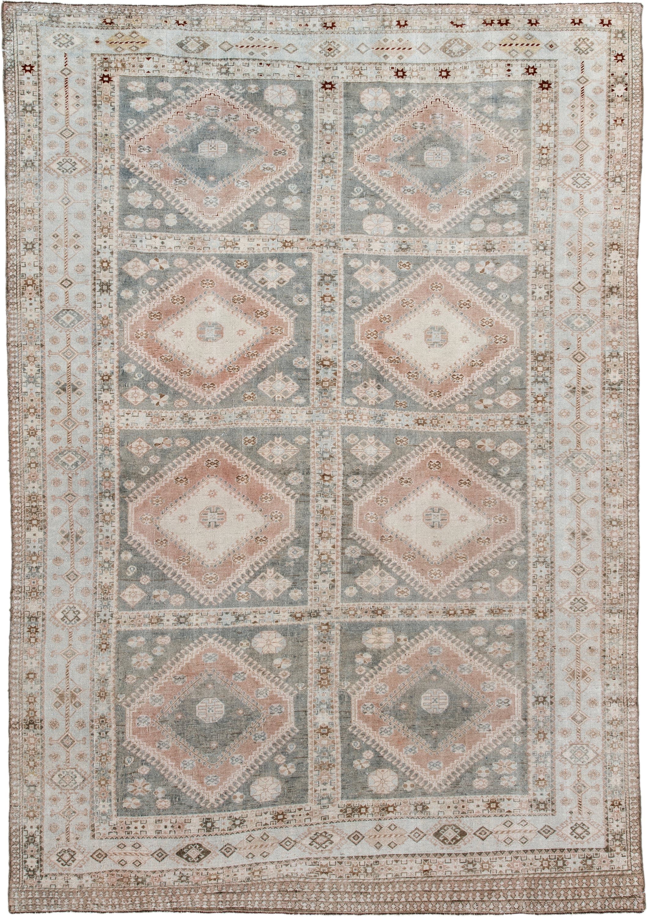 6' x 9' one-of-a-kind handmade antique Shiraz medium size rug. Color palette: ivory, blue_gray, blush, taupe, camel, rust