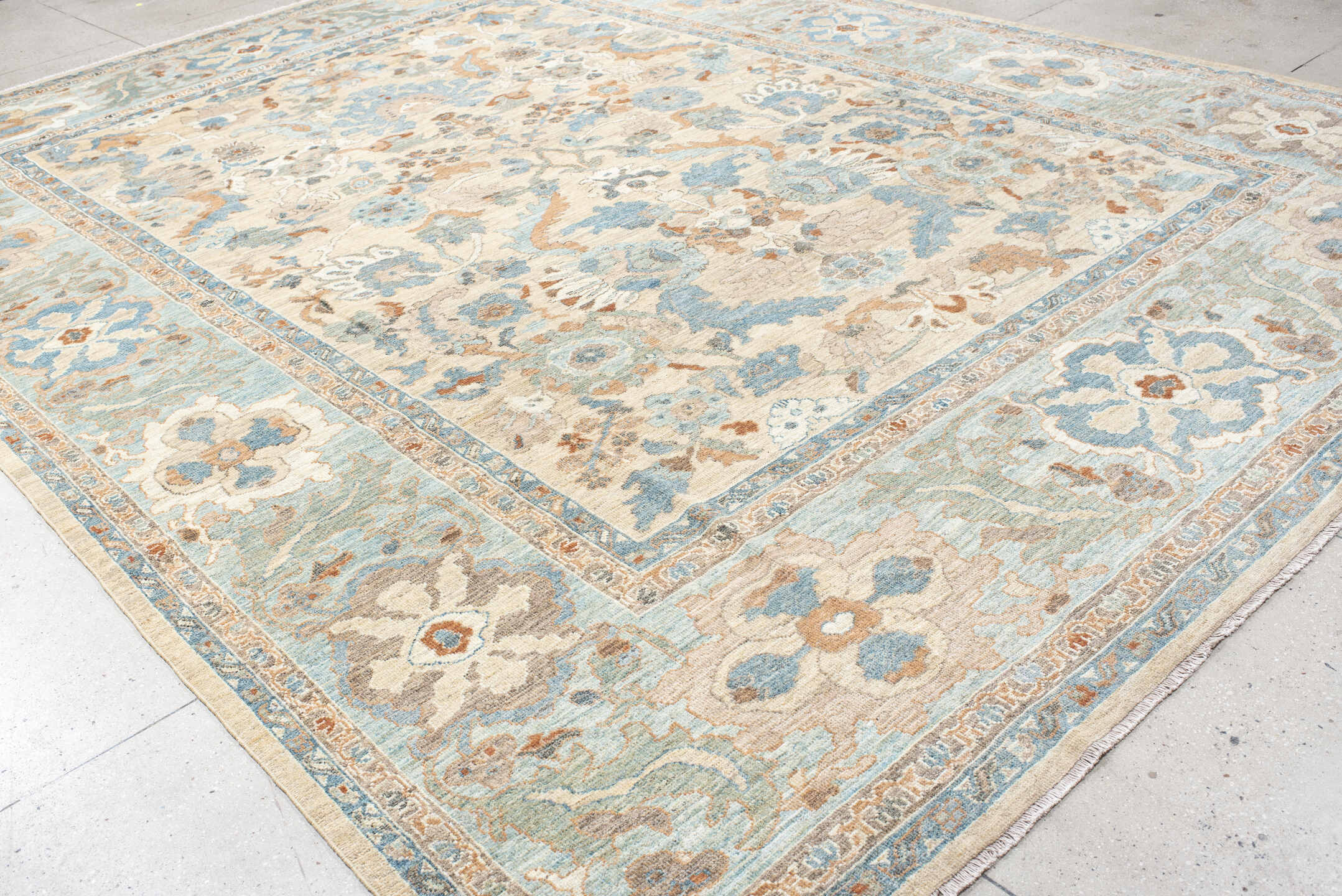 11' x 15' one-of-a-kind handmade vintage Sultanabad oversize rug. Color palette: ivory, pale blue, taupe, peach, beige, sage