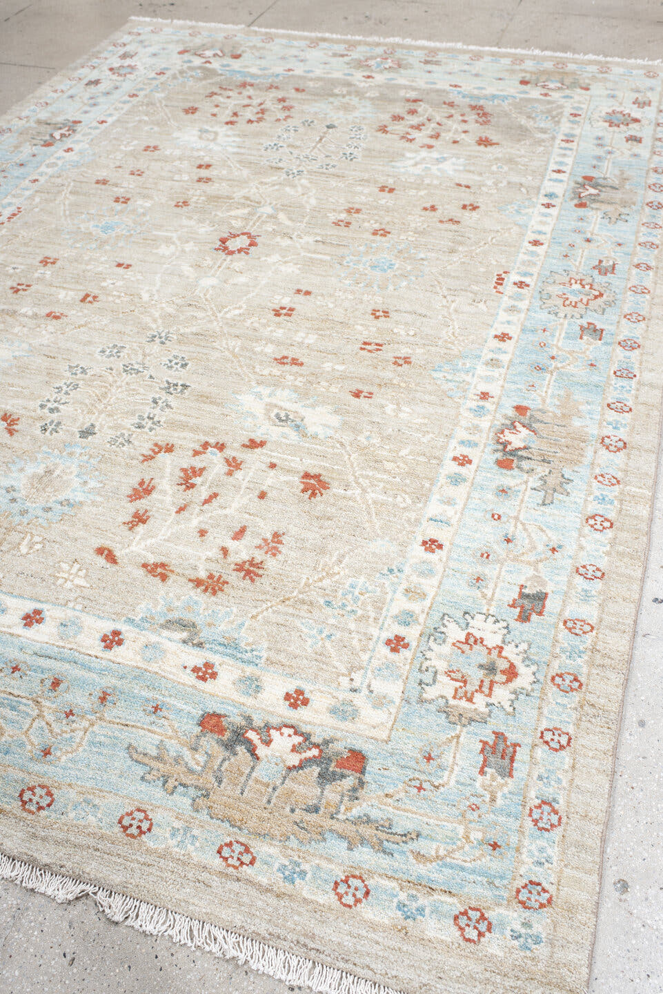 5' x 7' one-of-a-kind handmade vintage Sultanabad rug. Color palette: taupe, ivory, sky blue, rust, charcoal, cream, beige