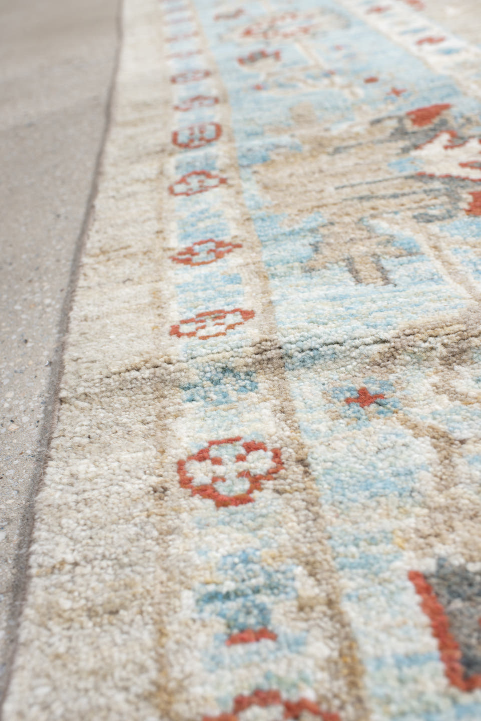 5' x 7' one-of-a-kind handmade vintage Sultanabad rug. Color palette: taupe, ivory, sky blue, rust, charcoal, cream, beige