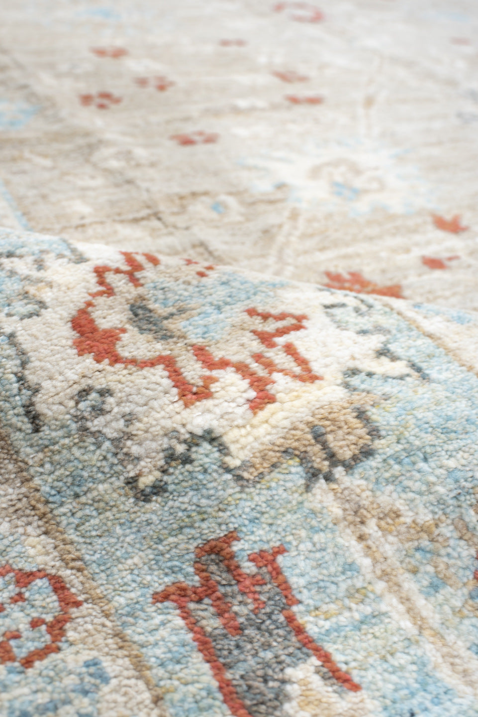 5' x 7' one-of-a-kind handmade vintage Sultanabad rug. Color palette: taupe, ivory, sky blue, rust, charcoal, cream, beige