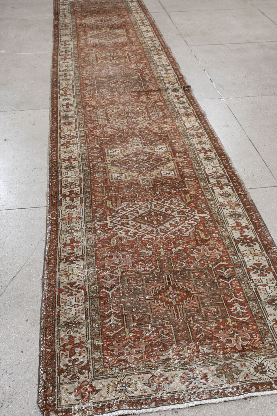 3' x 14' one-of-a-kind handmade vintage Karaje runner rug. Color palette: brown, gray, pink, light gray, off-white, redwood