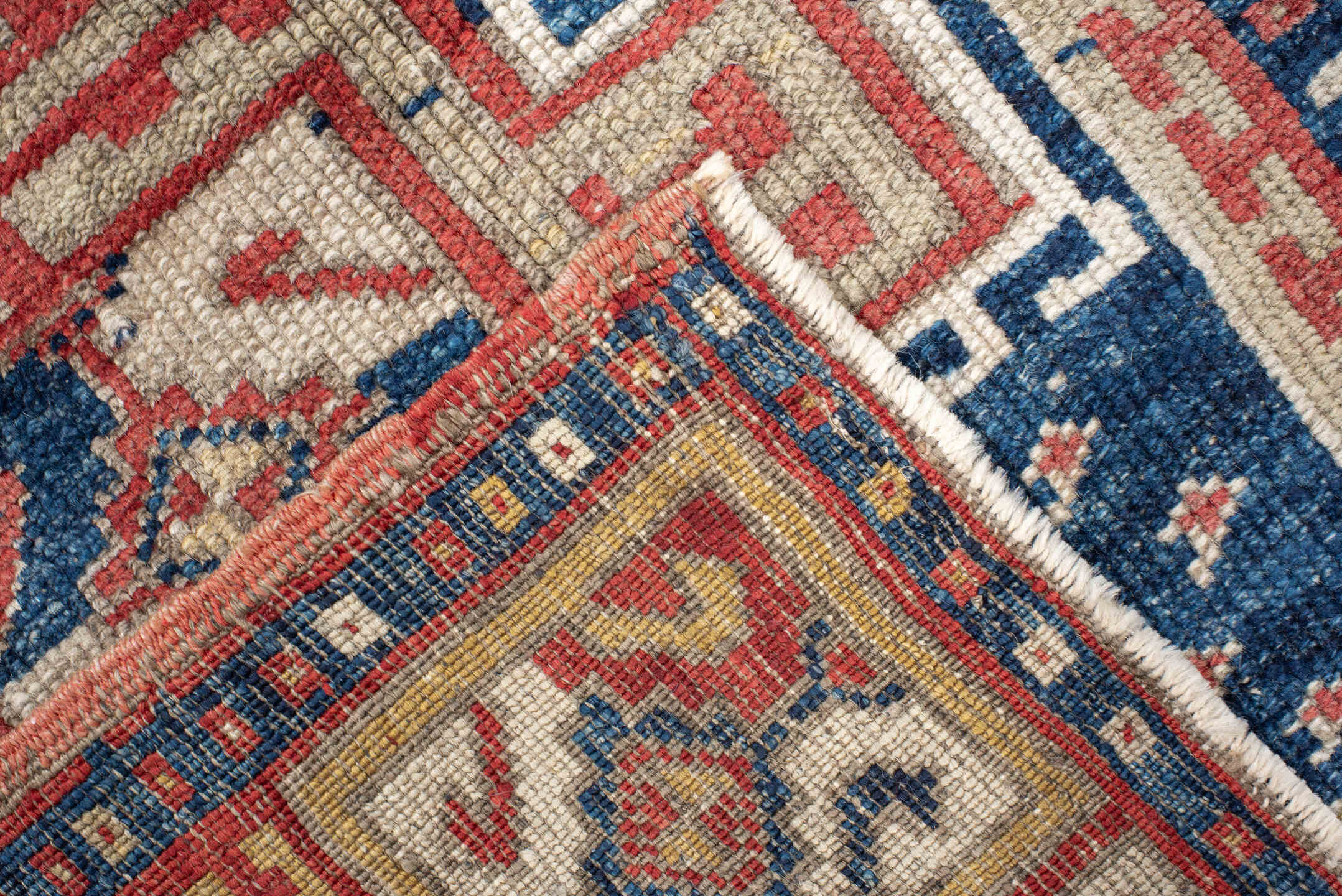 1' x 3' one-of-a-kind handmade vintage Anatolian small size rug. Color palette: navy, ivory, rust, brick, cream, blue