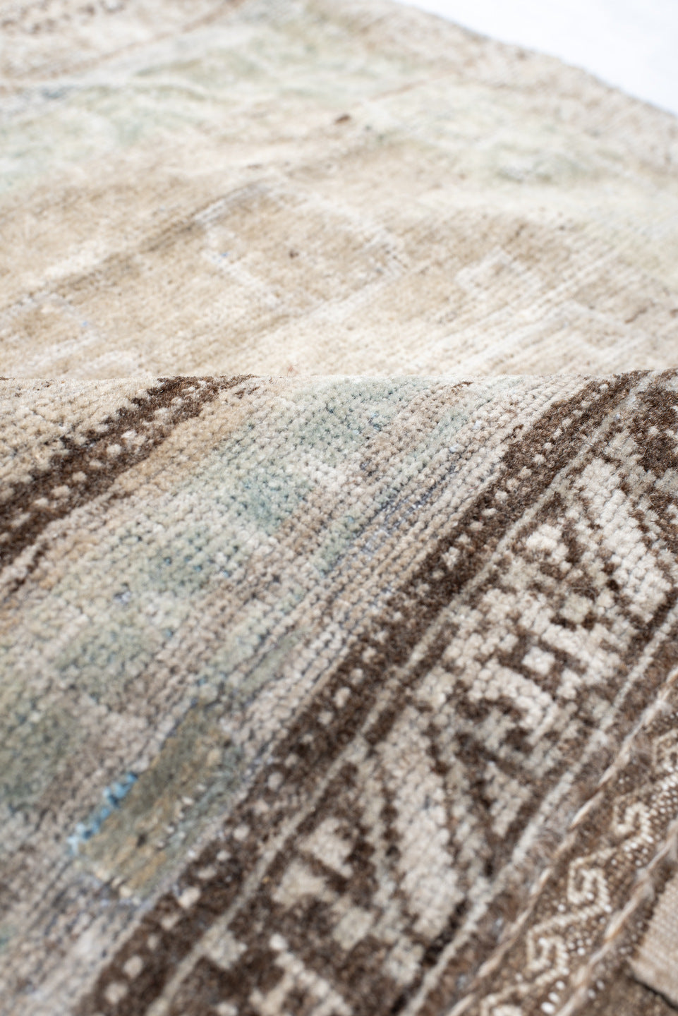 2' x 2' one-of-a-kind handmade vintage Belouch small size rug. Color palette: ivory, taupe, brown, sage, charcoal, cream