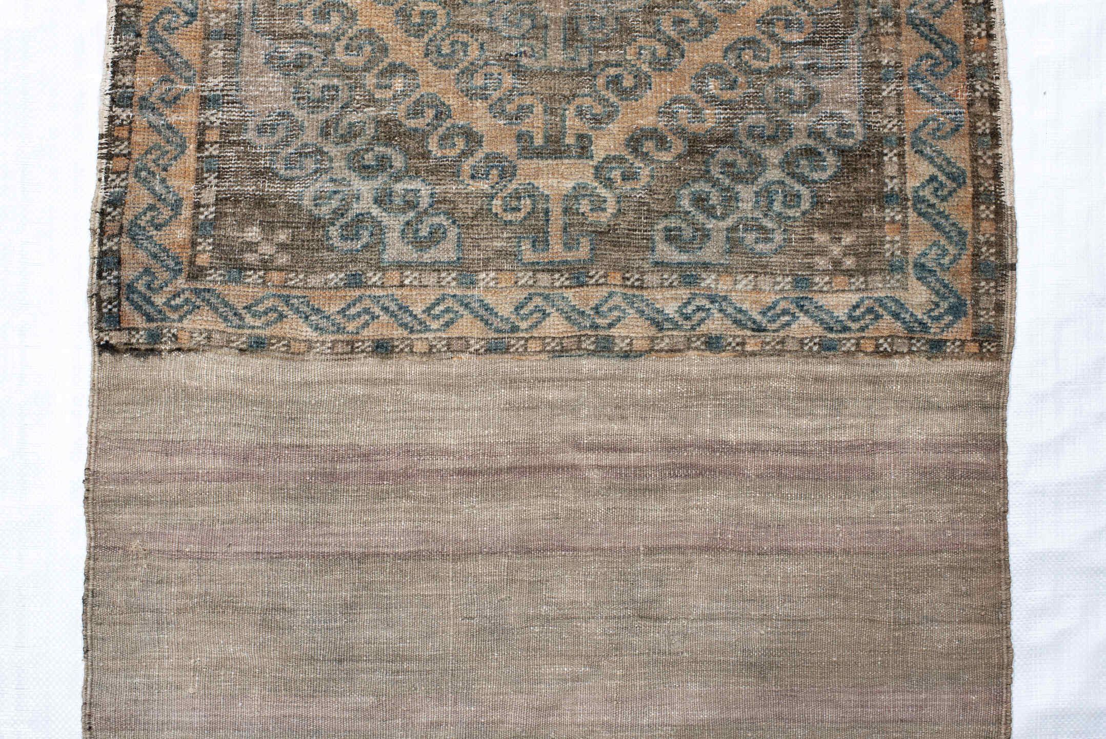 2' x 4' one-of-a-kind handmade vintage Belouch small size rug. Color palette: taupe, gray, slate, rust, ivory, charcoal