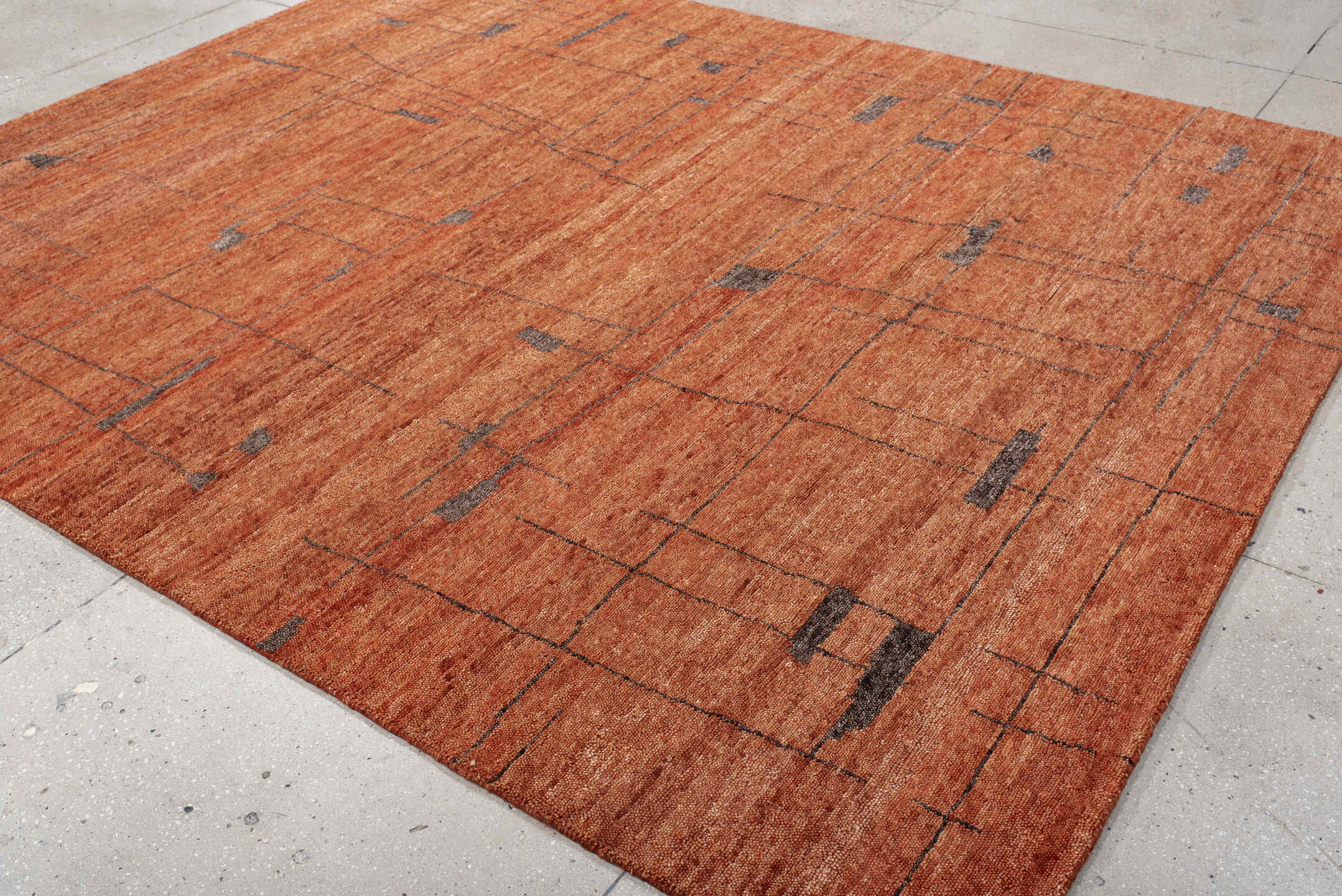 8' x 10' one-of-a-kind handmade vintage Tribeca large size rug. Color palette: terra cotta, rust, cinnamon, charcoal, copper
