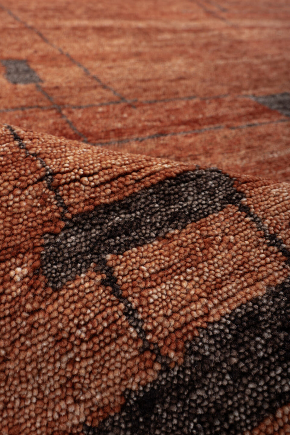 8' x 10' one-of-a-kind handmade vintage Tribeca large size rug. Color palette: terra cotta, rust, cinnamon, charcoal, copper