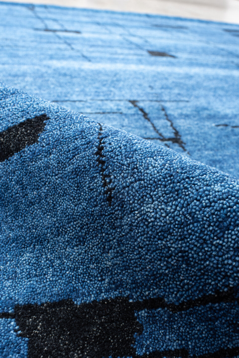 8' x 9' one-of-a-kind handmade vintage Tribeca rug. Color palette: blue, black, slate, gray