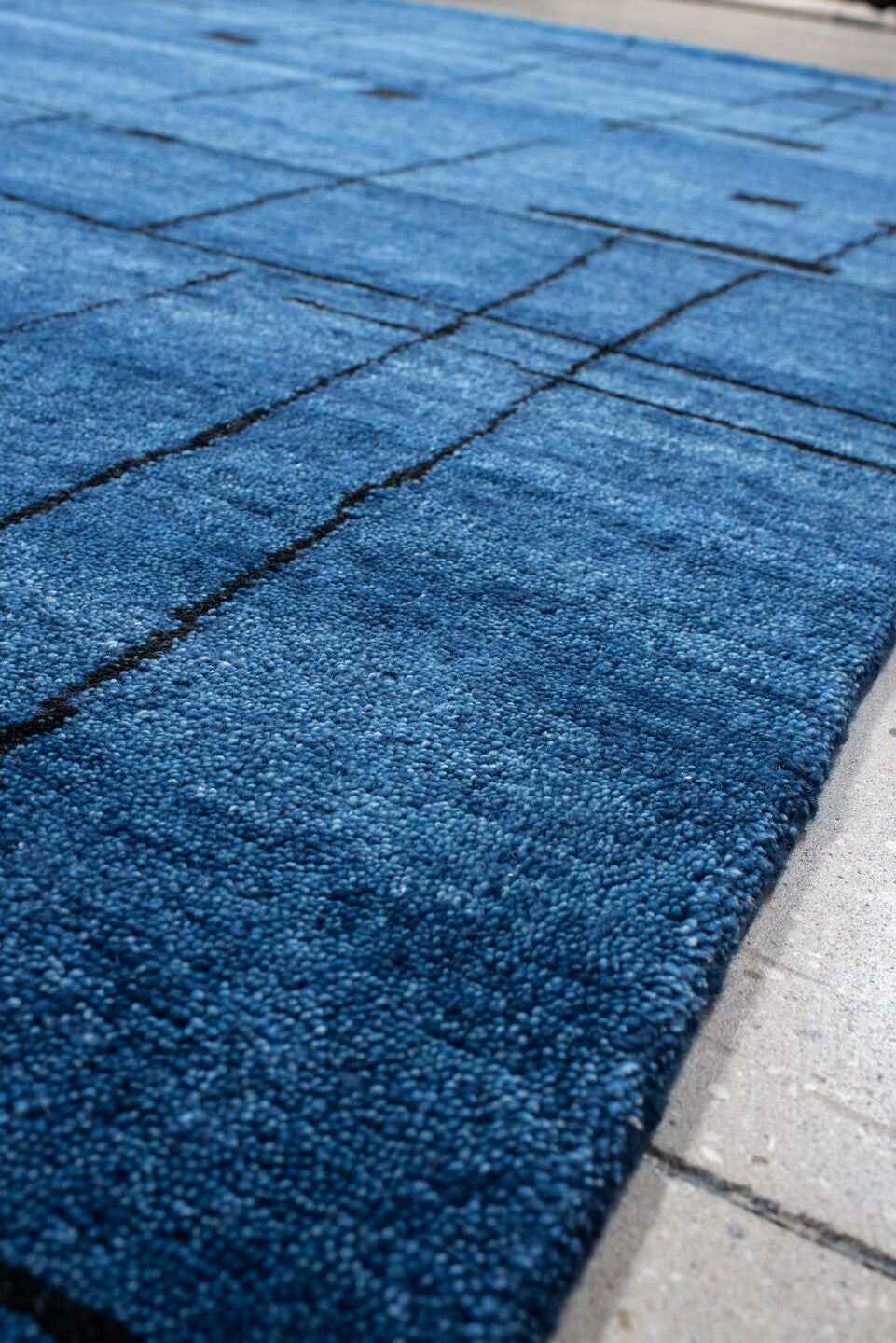 8' x 9' one-of-a-kind handmade vintage Tribeca rug. Color palette: blue, black, slate, gray