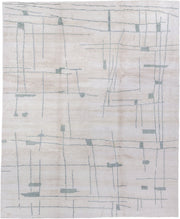 8' x 10' one-of-a-kind handmade vintage Tribeca large size rug. Color palette: ivory, pale blue, cream, light gray