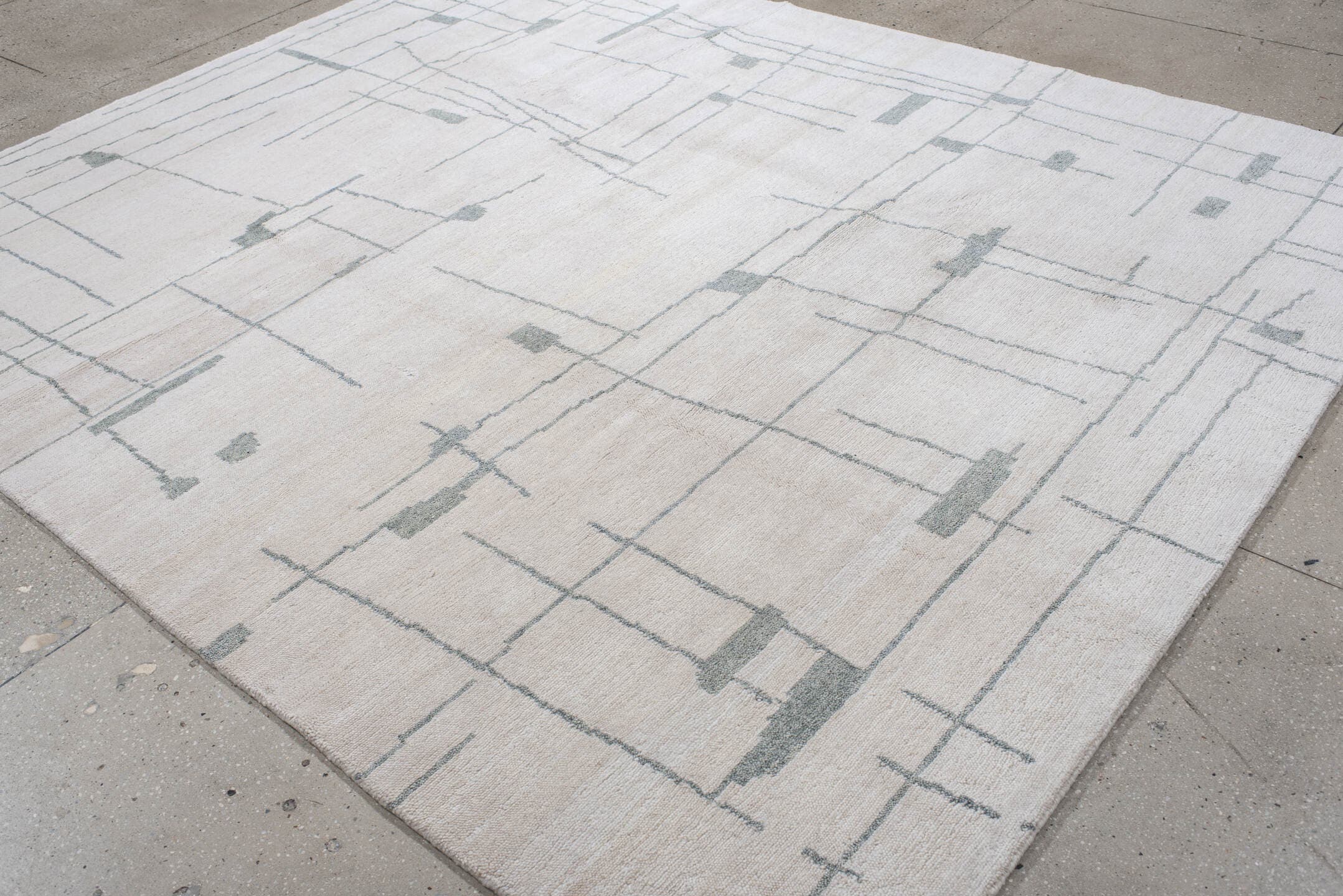 8' x 10' one-of-a-kind handmade vintage Tribeca large size rug. Color palette: ivory, pale blue, cream, light gray