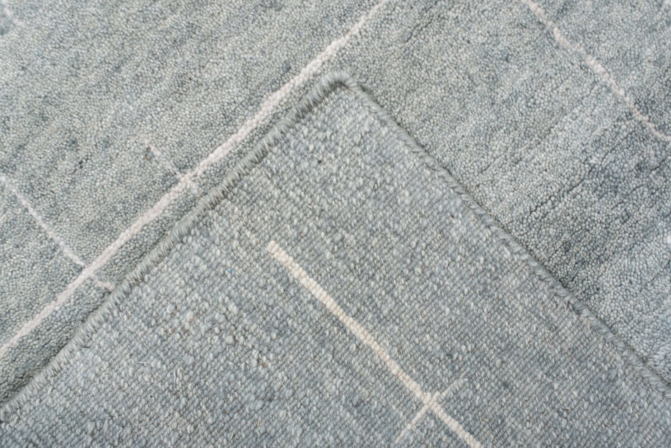 8' x 10' one-of-a-kind handmade vintage Tribeca large size rug. Color palette: pale blue, ivory, silver, mist, light blue