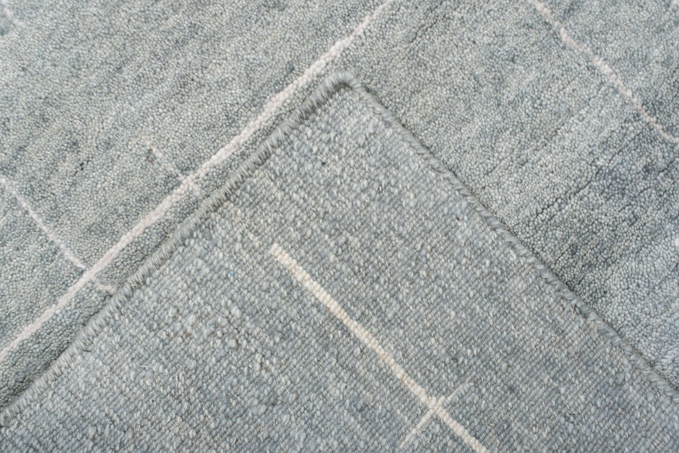 8' x 10' one-of-a-kind handmade vintage Tribeca large size rug. Color palette: pale blue, ivory, silver, mist, light blue