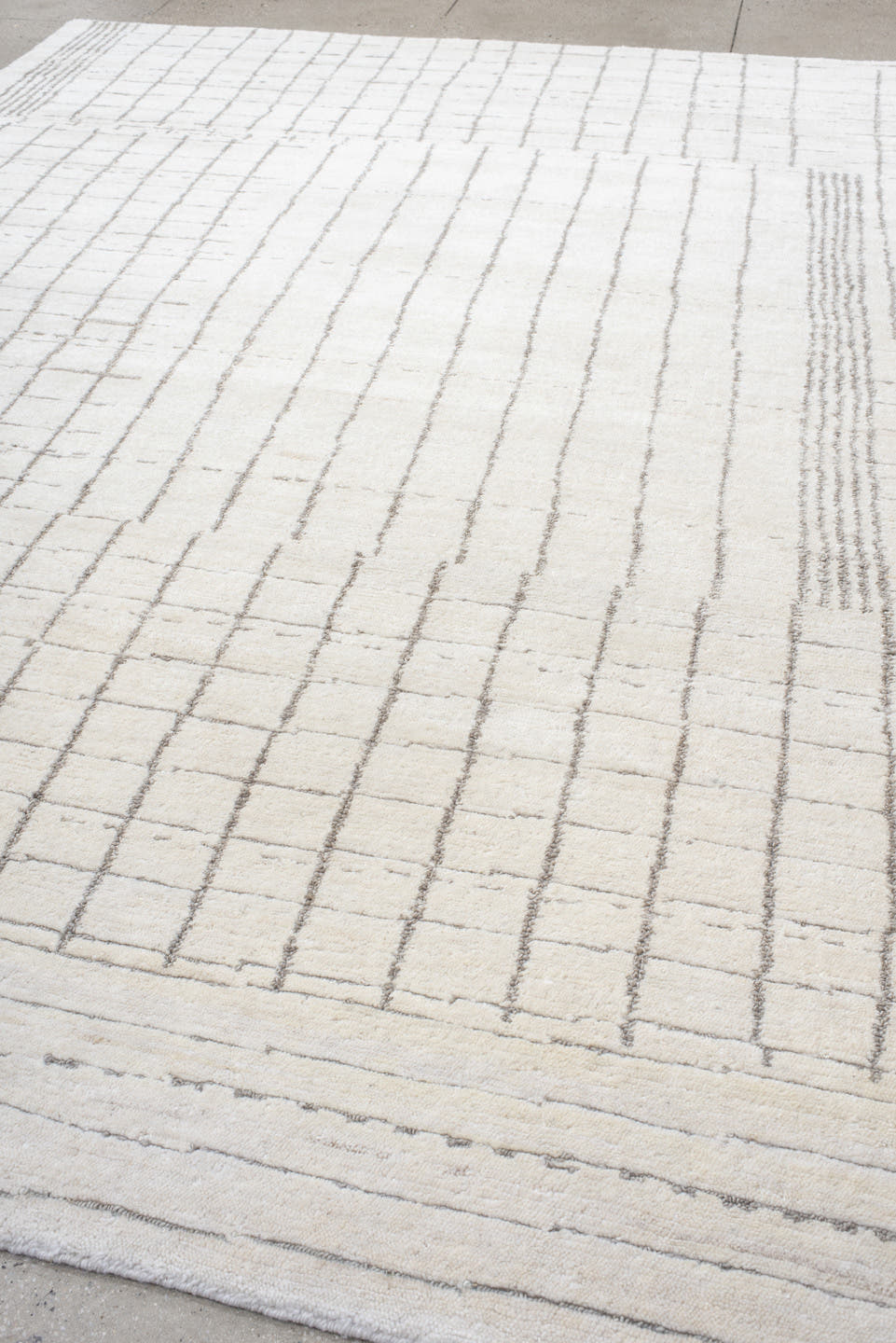 9' x 12' one-of-a-kind handmade vintage Tribeca large size rug. Color palette: ivory, taupe, cream, beige, light gray, gray