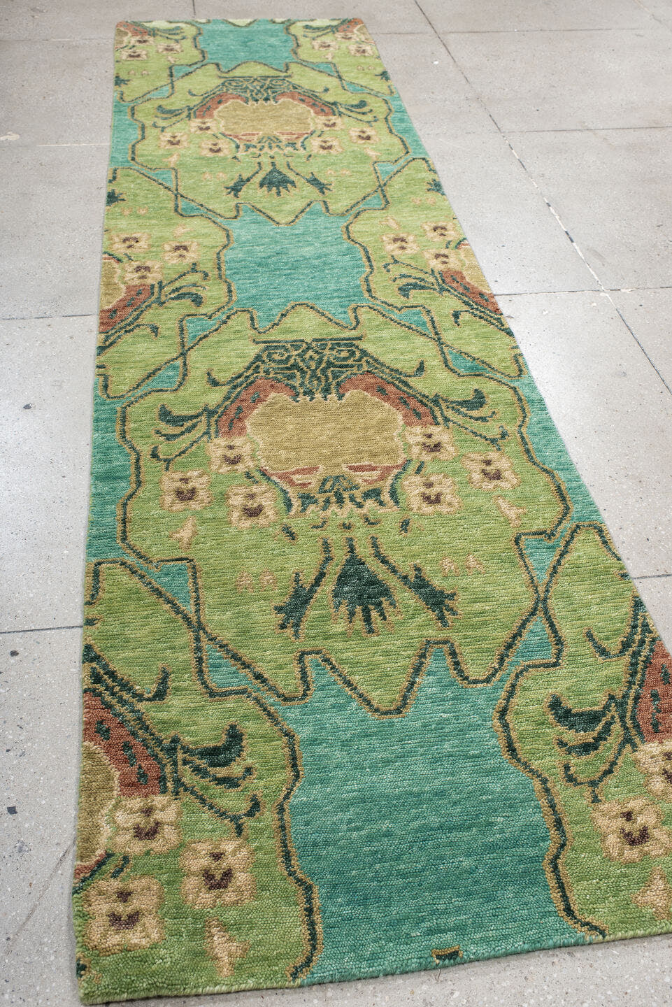 3' x 12' one-of-a-kind handmade vintage Tribeca runner rug. Color palette: aqua, sage, ivory, charcoal, blush, taupe, teal