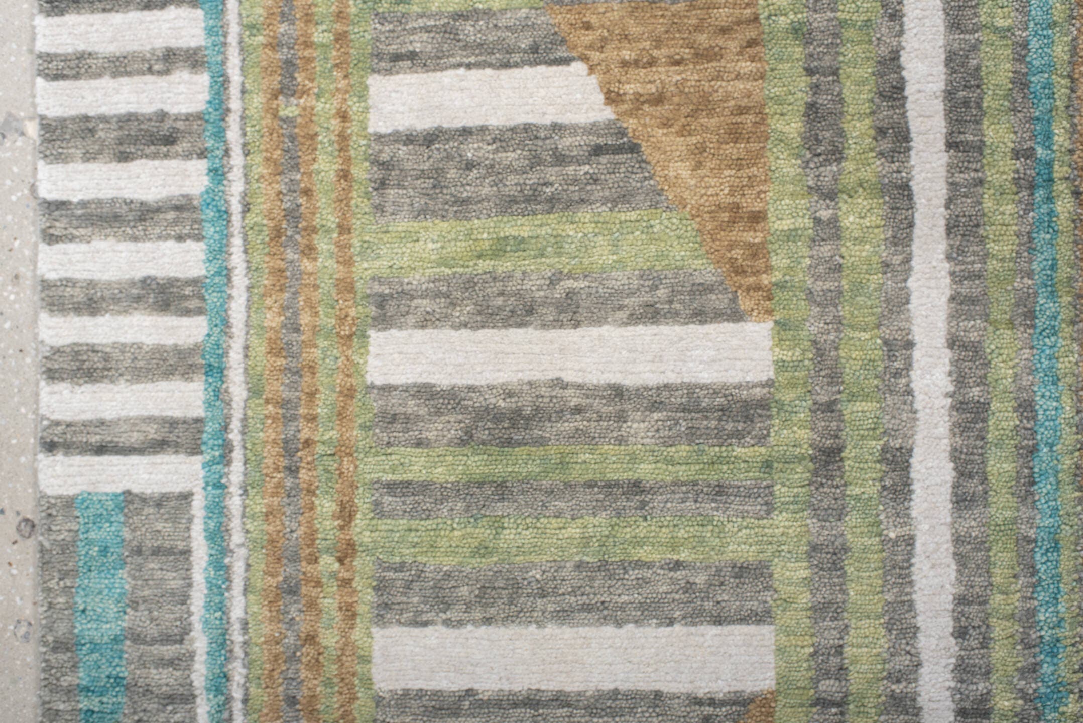 9' x 12' one-of-a-kind handmade vintage Tribeca large size rug. Color palette: teal, ivory, charcoal, taupe, olive, camel