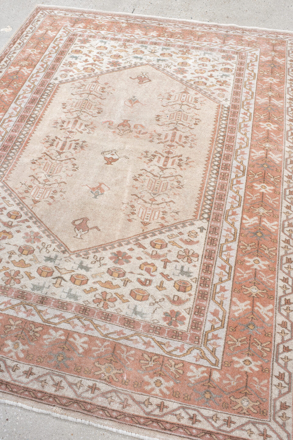 5' x 6' one-of-a-kind handmade vintage Melas rug. Color palette: ivory, blush, salmon, taupe, gray, camel, pink, beige