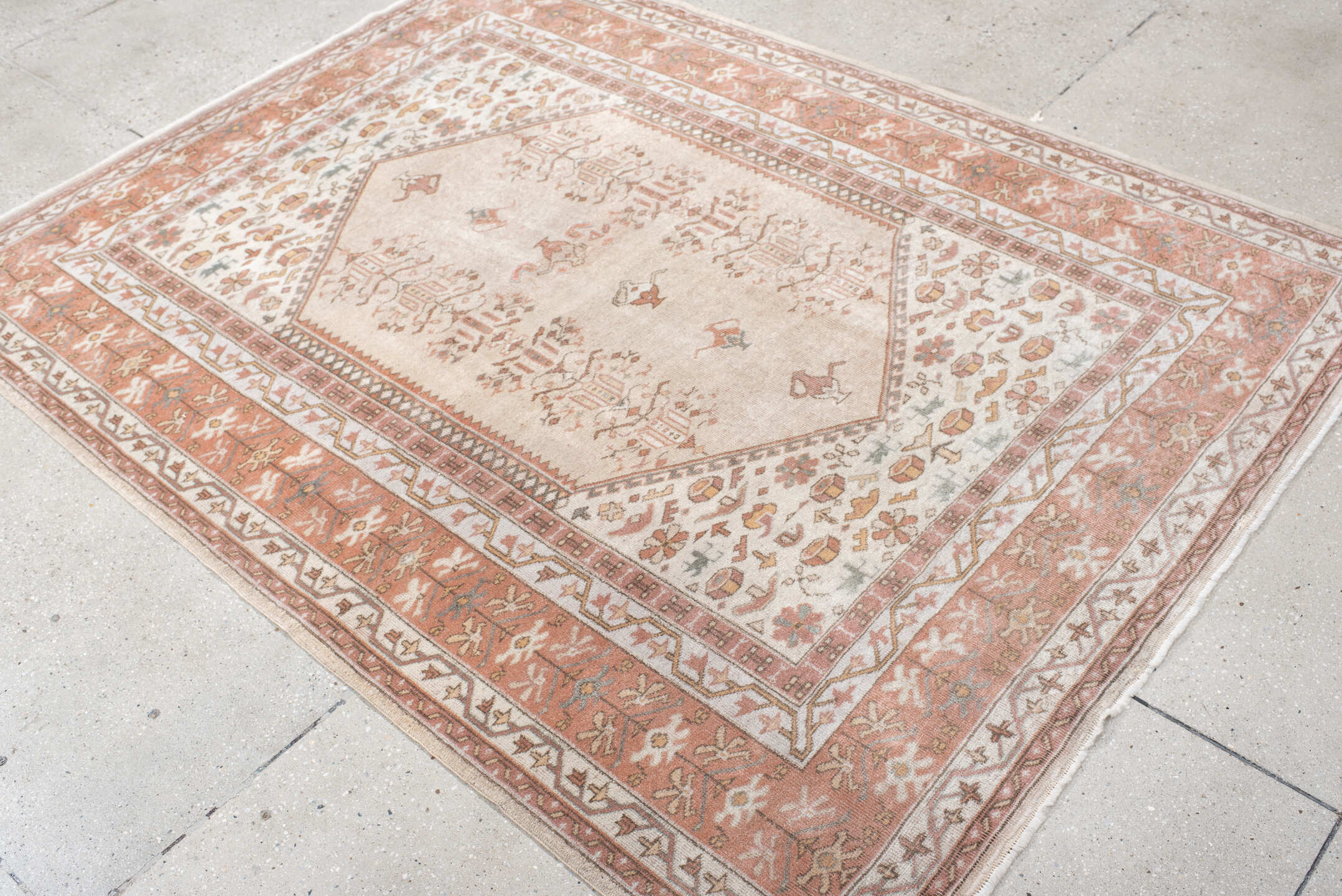 5' x 6' one-of-a-kind handmade vintage Melas rug. Color palette: ivory, blush, salmon, taupe, gray, camel, pink, beige