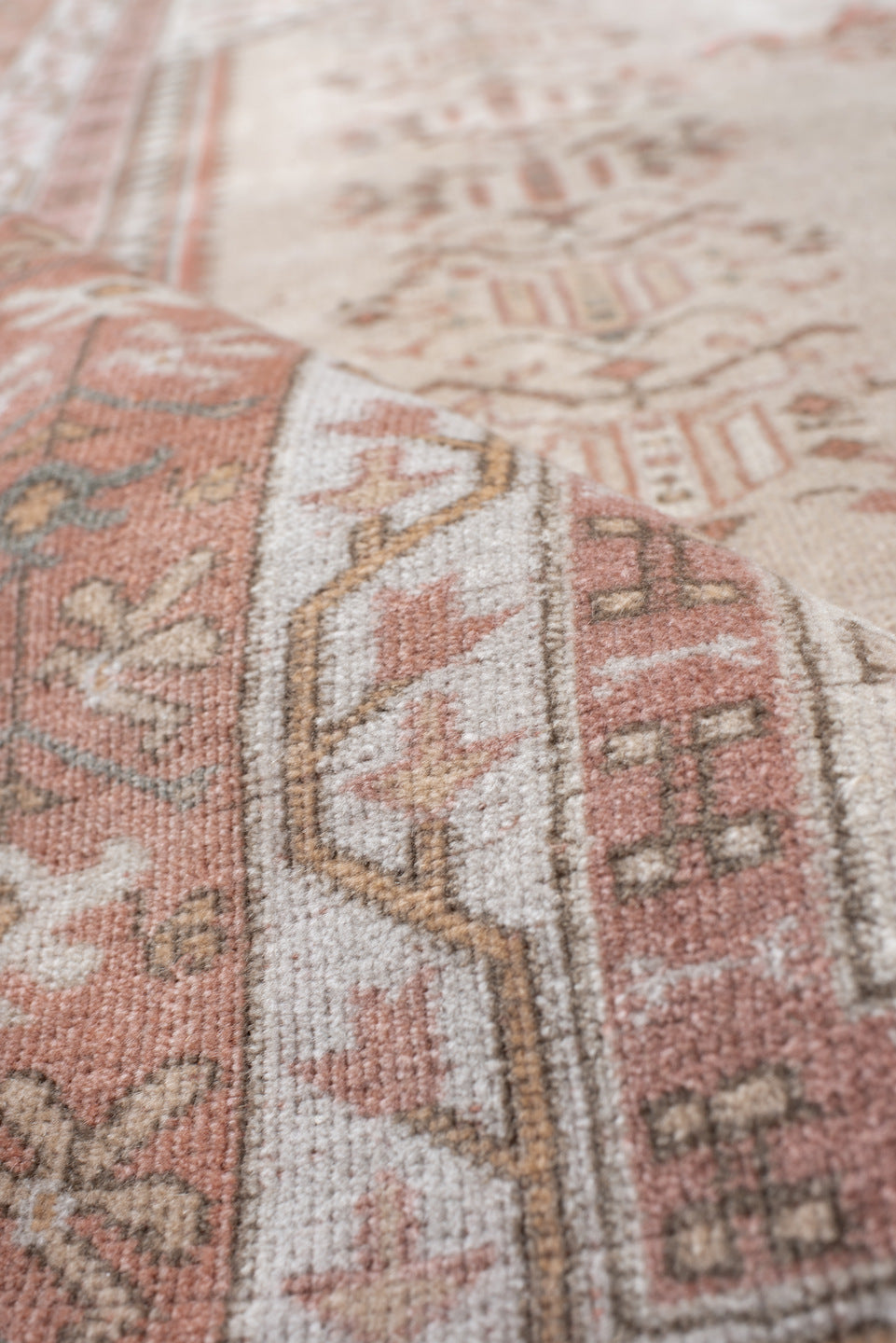5' x 6' one-of-a-kind handmade vintage Melas rug. Color palette: ivory, blush, salmon, taupe, gray, camel, pink, beige