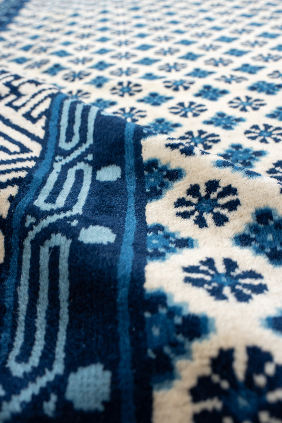 7' x 10' one-of-a-kind handmade vintage Chinese large size rug. Color palette: ivory, indigo, navy, slate, purple, blue