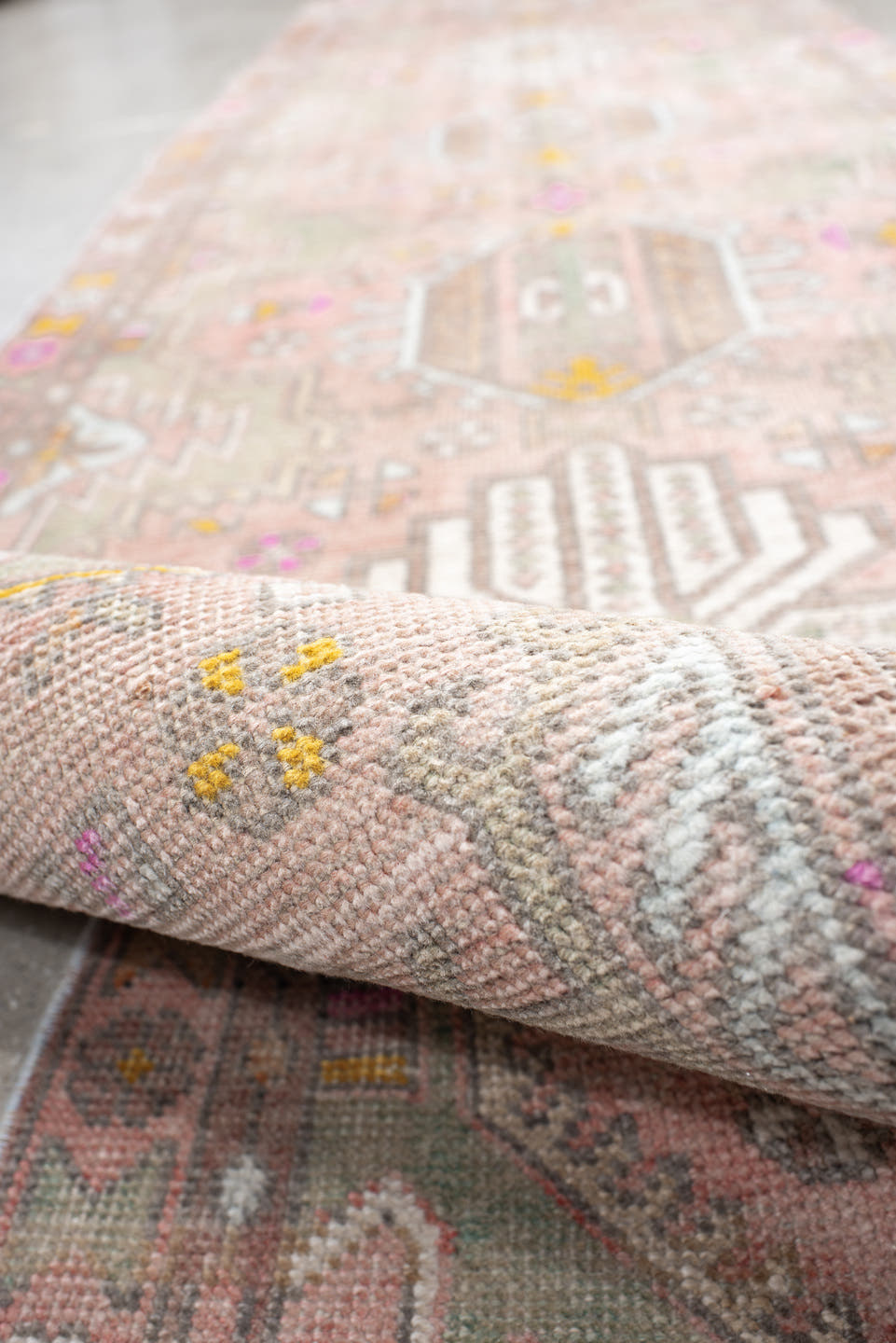 3' x 12' one-of-a-kind handmade vintage Anatolian runner rug. Color palette: blush, taupe, ivory, sage, gold, rose, peach