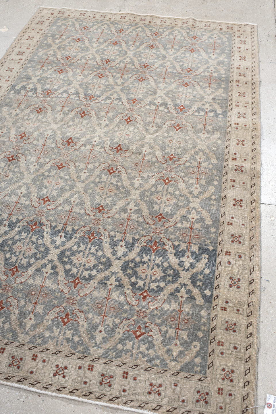 4' x 7' one-of-a-kind handmade antique Tabriz rug. Color palette: ivory, blue-gray, taupe, rust, slate, cream, gray, blue