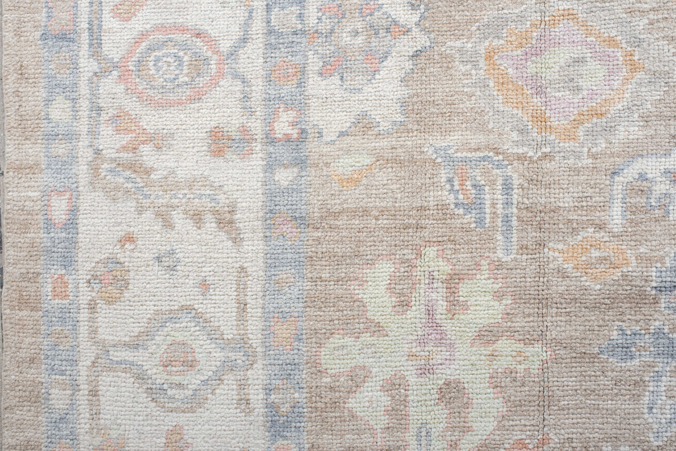 8' x 9' one-of-a-kind handmade vintage Oushak rug. Color palette: taupe, ivory, pale blue, coral, peach, beige, sage, gray
