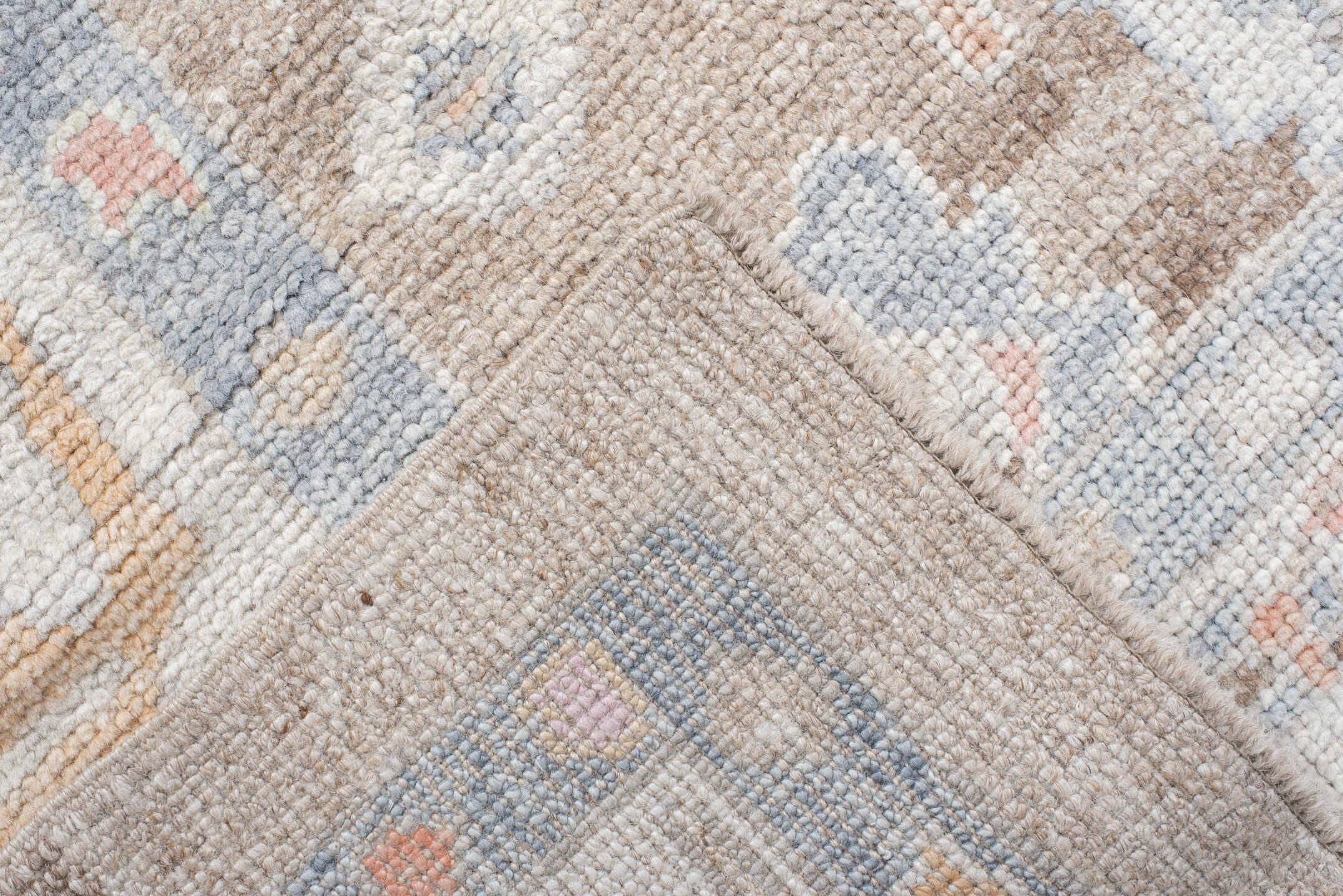 8' x 9' one-of-a-kind handmade vintage Oushak rug. Color palette: taupe, ivory, pale blue, coral, peach, beige, sage, gray