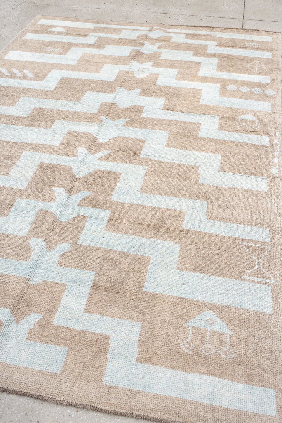6' x 9' one-of-a-kind handmade vintage Oushak medium size rug. Color palette: beige, ivory, pale blue, light blue