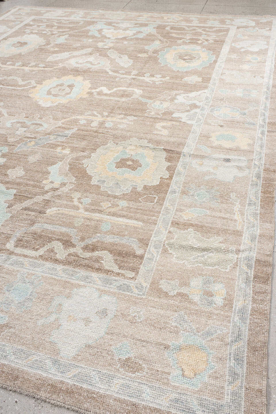 10' x 14' one-of-a-kind handmade vintage  large size rug. Color palette: taupe, ivory, pale aqua, cream, soft gold, beige