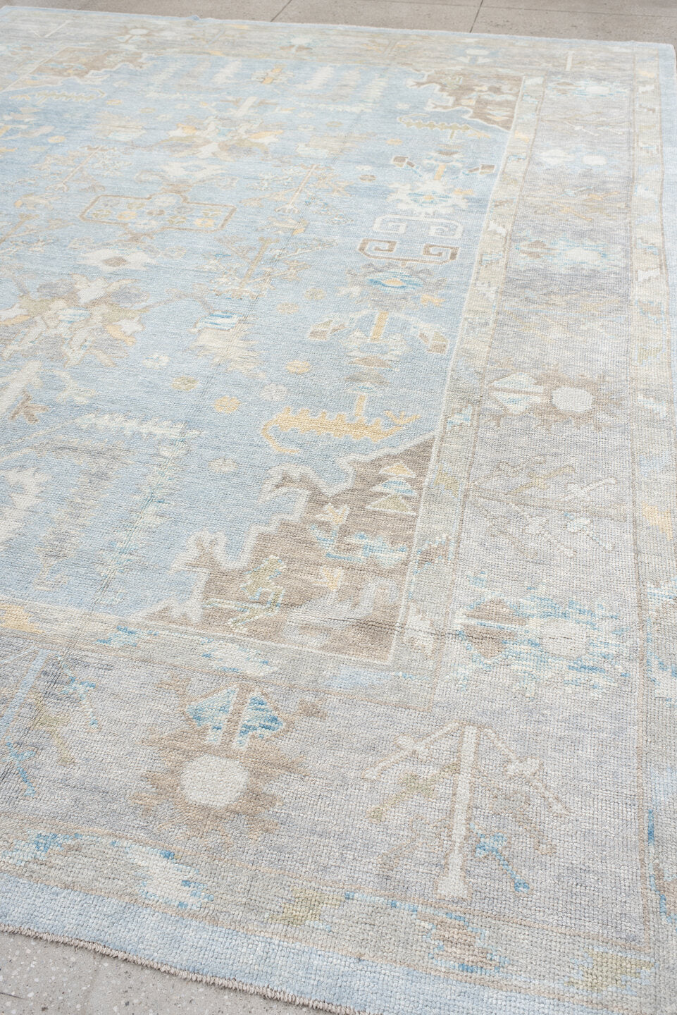10' x 14' one-of-a-kind handmade vintage Oushak large size rug. Color palette: pale blue, ivory, taupe, light gold, cream