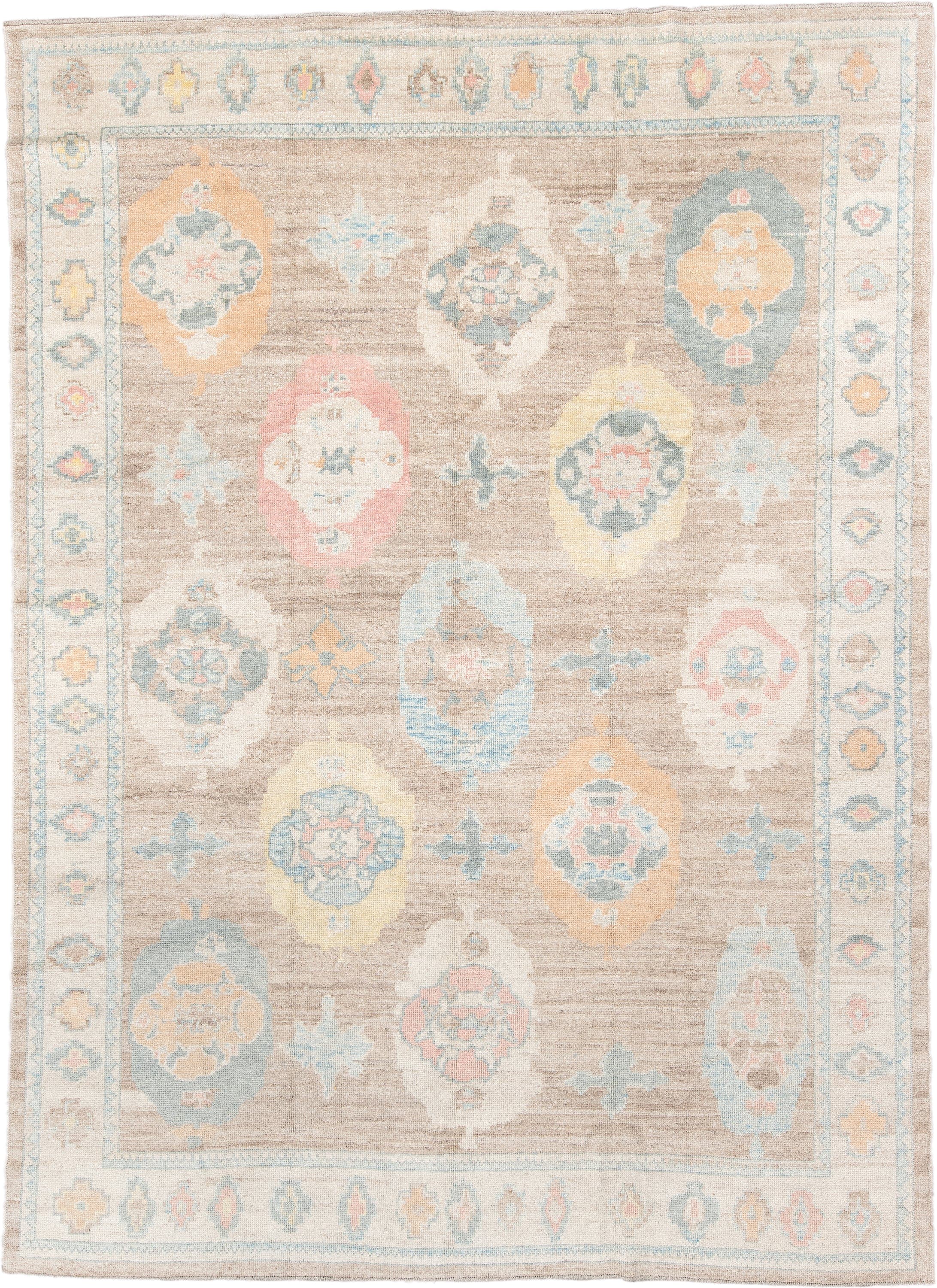 9' x 12' one-of-a-kind handmade vintage Oushak large size rug. Color palette: taupe, ivory, pale blue, peach, soft gold