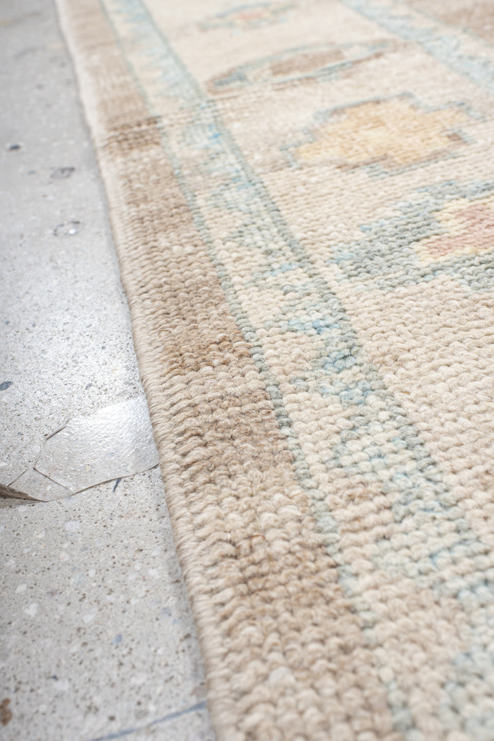 9' x 12' one-of-a-kind handmade vintage Oushak large size rug. Color palette: taupe, ivory, pale blue, peach, soft gold