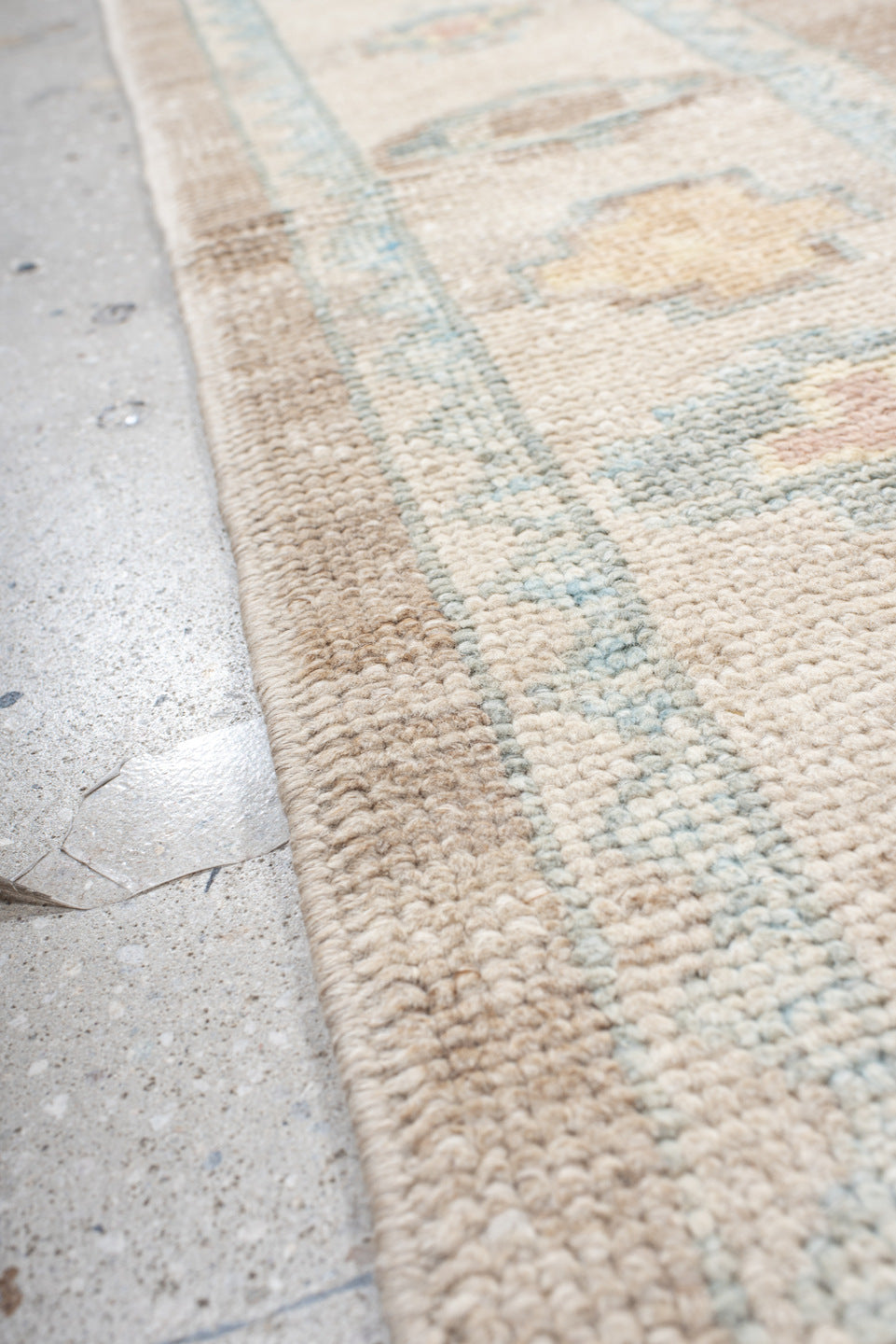9' x 12' one-of-a-kind handmade vintage Oushak large size rug. Color palette: taupe, ivory, pale blue, peach, soft gold