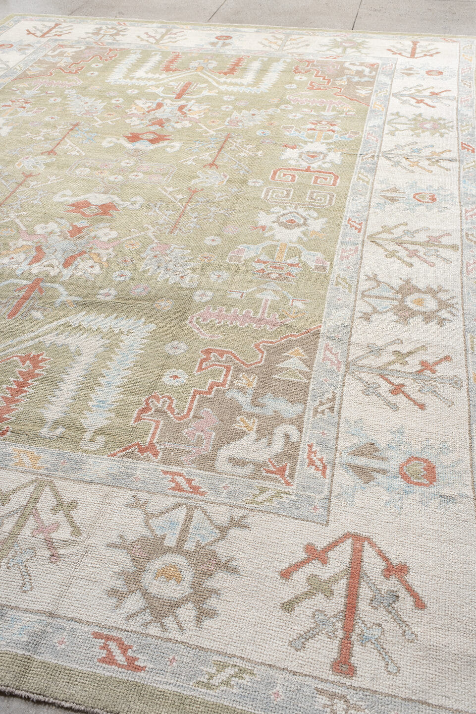 10' x 13' one-of-a-kind handmade vintage Oushak large size rug. Color palette: sage, ivory, pale blue, taupe, coral, cream