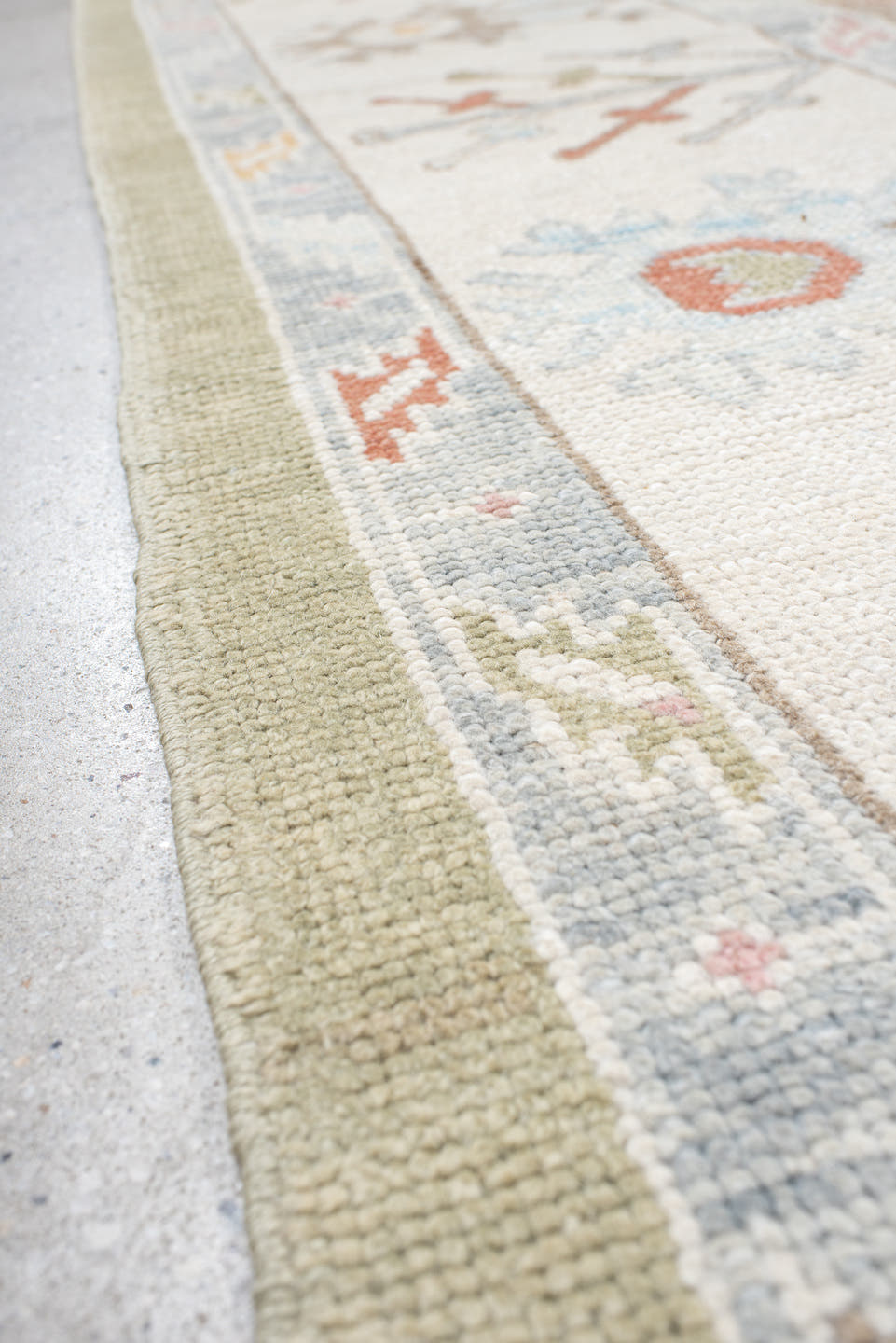 10' x 13' one-of-a-kind handmade vintage Oushak large size rug. Color palette: sage, ivory, pale blue, taupe, coral, cream