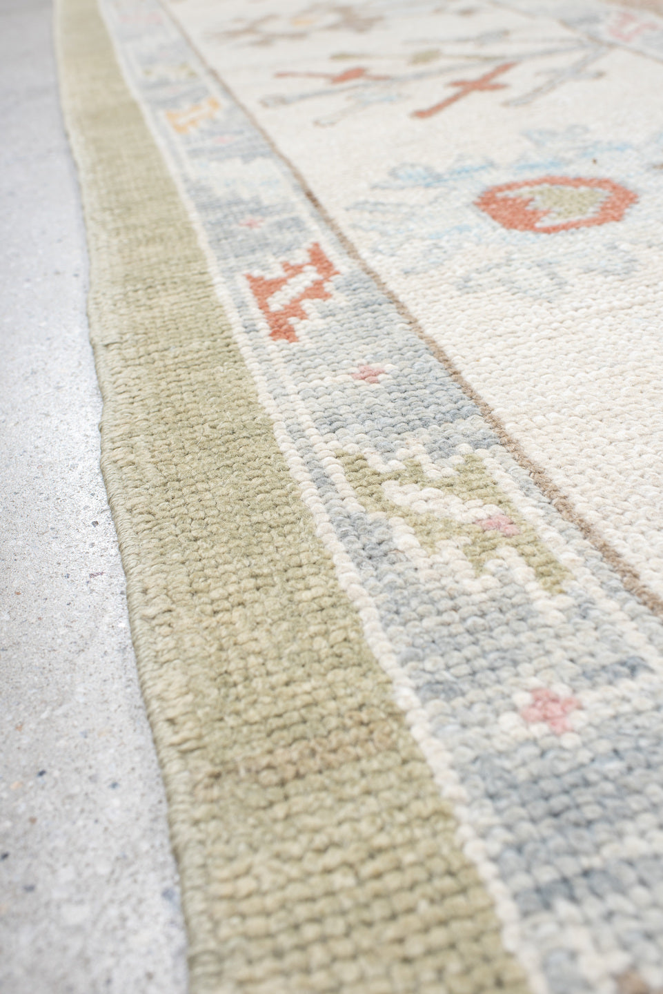 10' x 13' one-of-a-kind handmade vintage Oushak large size rug. Color palette: sage, ivory, pale blue, taupe, coral, cream