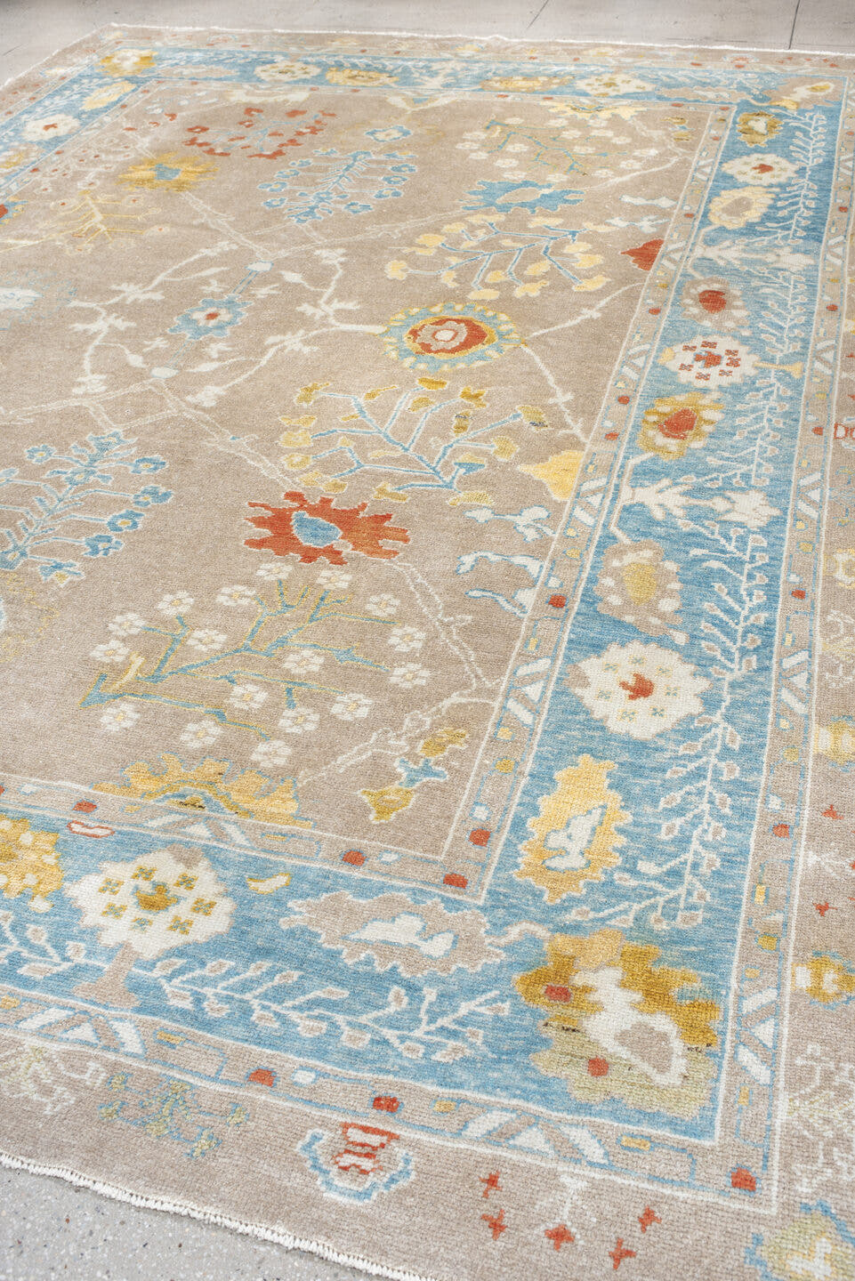 9' x 13' one-of-a-kind handmade vintage Oushak large size rug. Color palette: taupe, powder_blue, ivory, gold, coral, sage