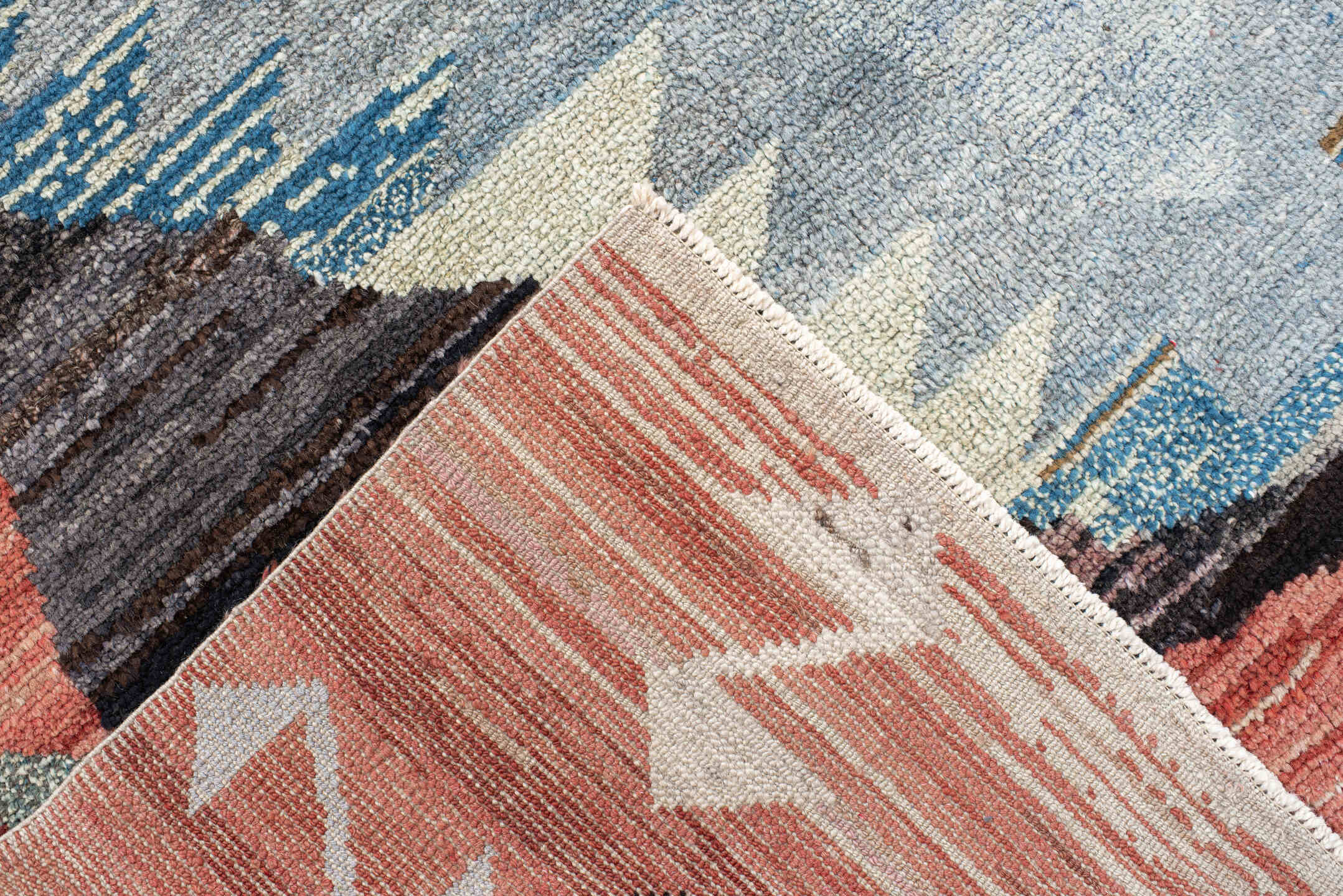 9' x 11' one-of-a-kind handmade vintage Kars large size rug. Color palette: terra cotta, charcoal, ivory, sky blue, taupe