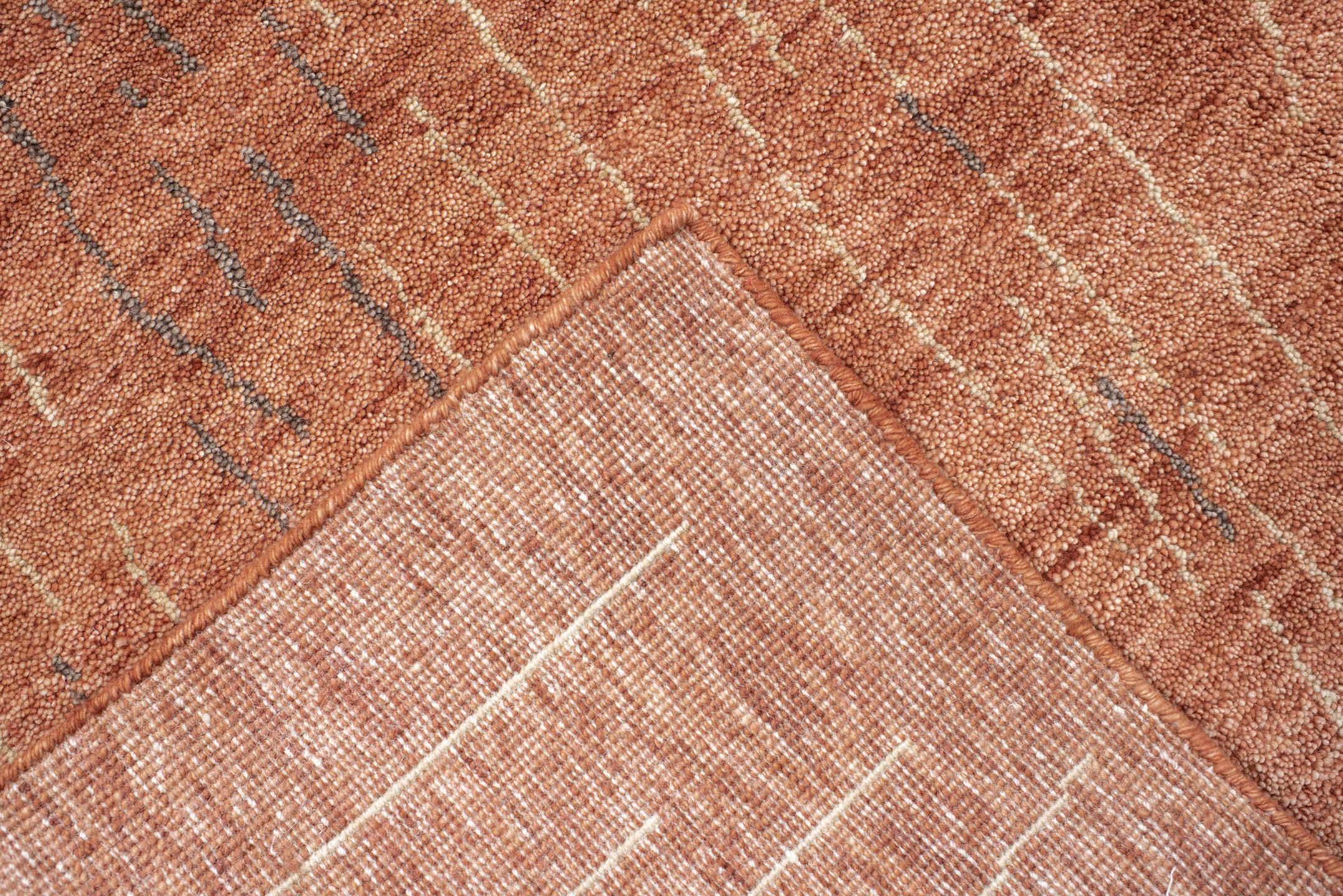 8' x 9' one-of-a-kind handmade vintage Tribeca rug. Color palette: terra cotta, rose, ivory, charcoal, terracotta, brown