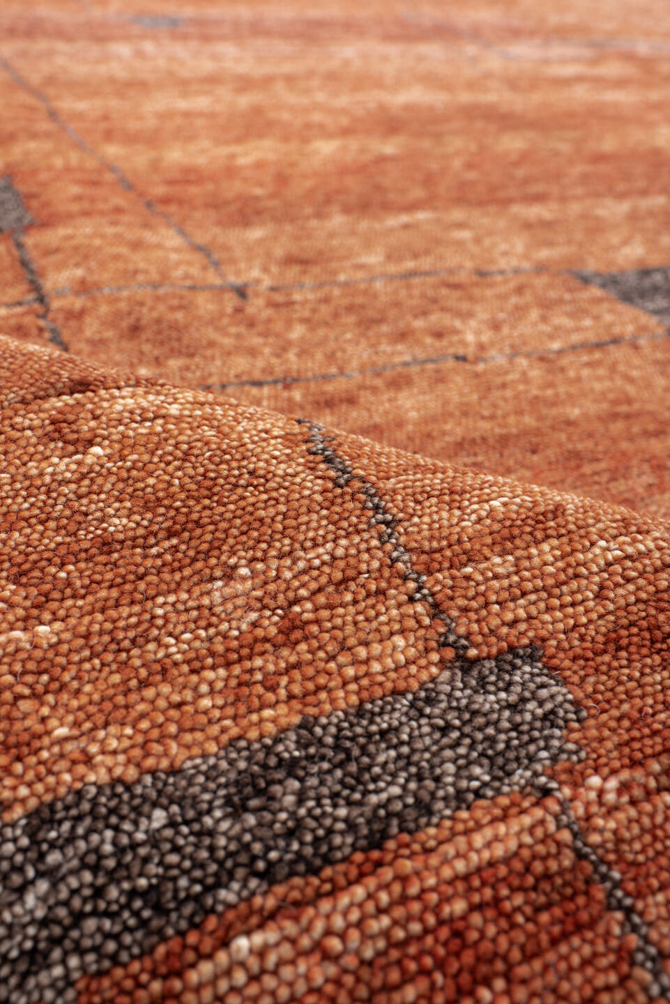 9' x 12' one-of-a-kind handmade vintage Tribeca large size rug. Color palette: terra cotta, rust, charcoal, copper