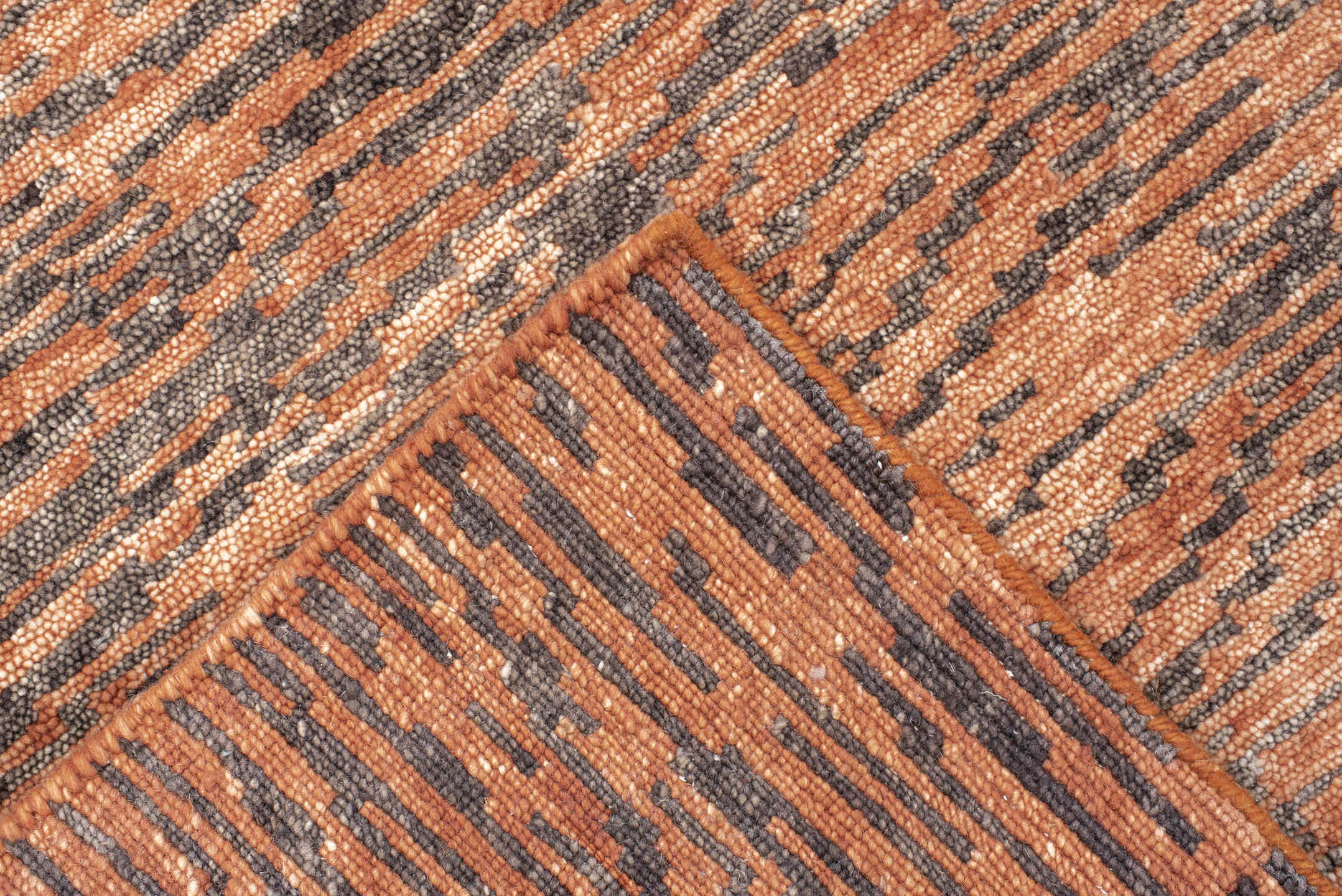 8' x 10' one-of-a-kind handmade vintage Tribeca large size rug. Color palette: terra cotta, charcoal, rose, taupe, camel
