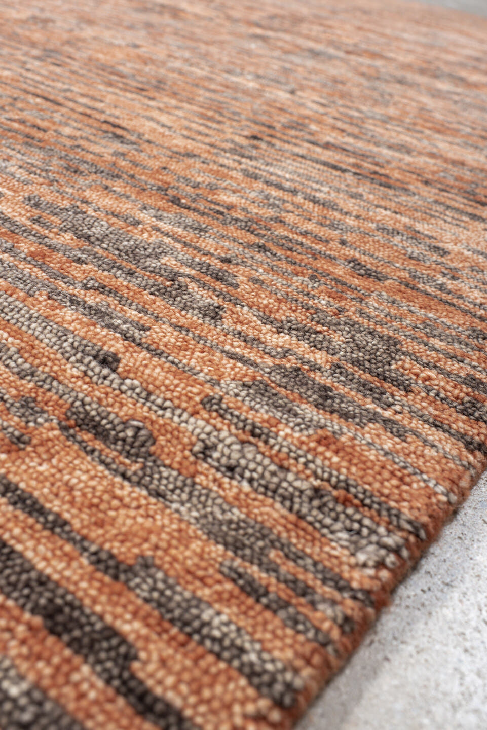 8' x 10' one-of-a-kind handmade vintage Tribeca large size rug. Color palette: terra cotta, charcoal, rose, taupe, camel